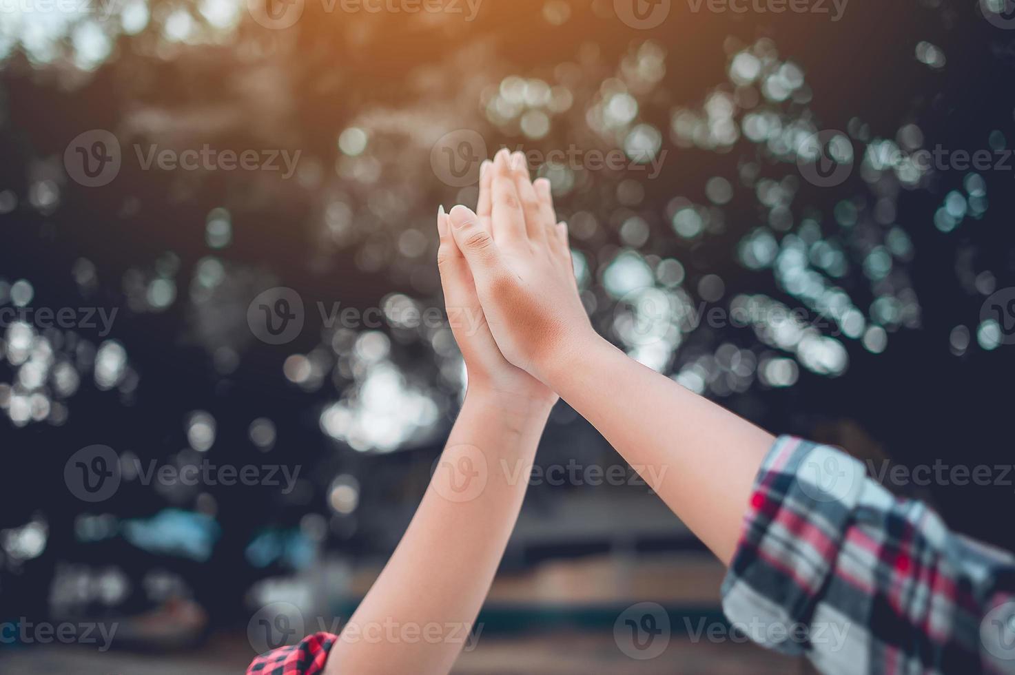 The hands of two people represent unity in work. Successful Business To be a good team photo