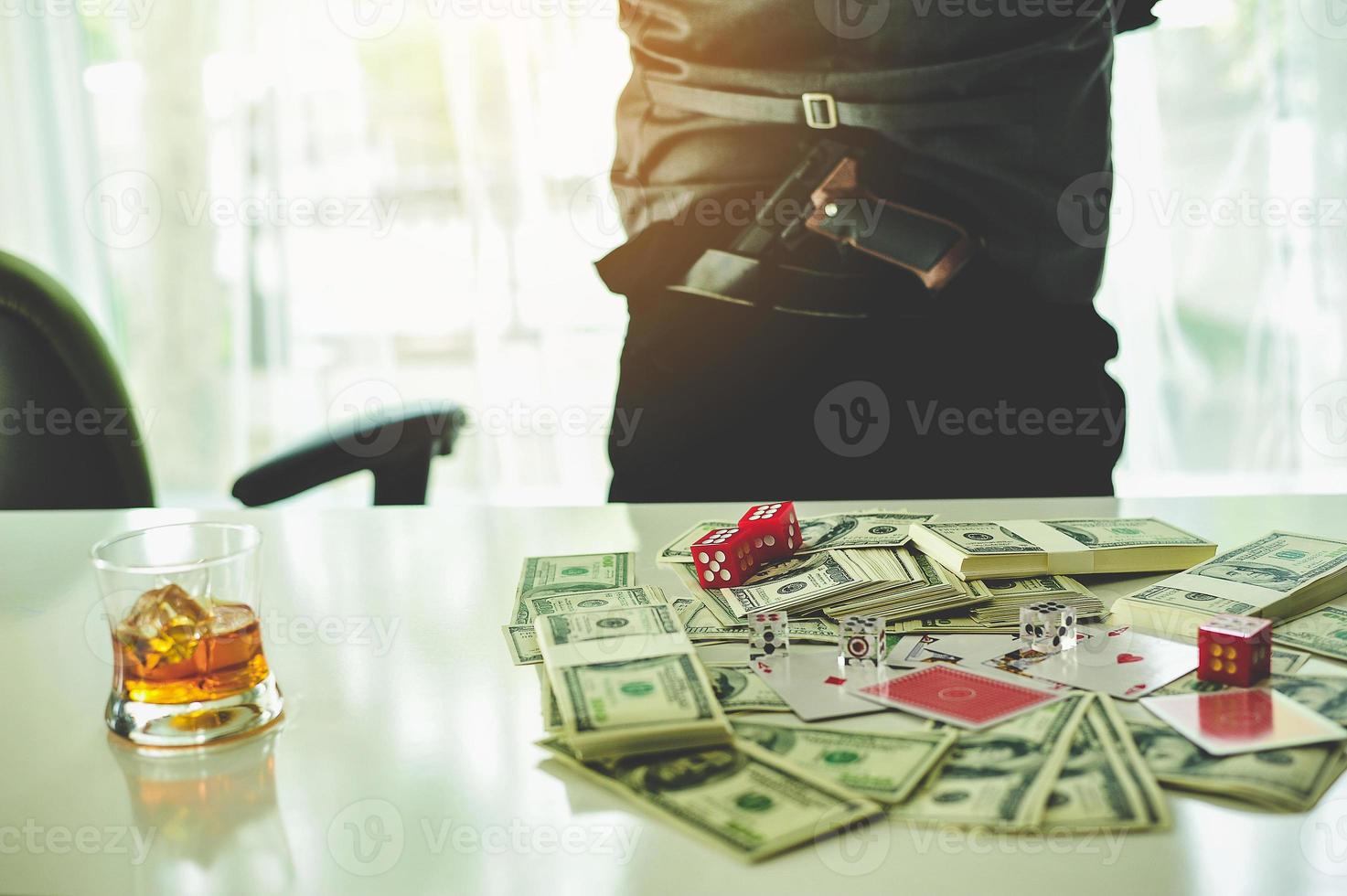 Money and hands of a young businessman. Success in the business. And his money. Put on the desk photo