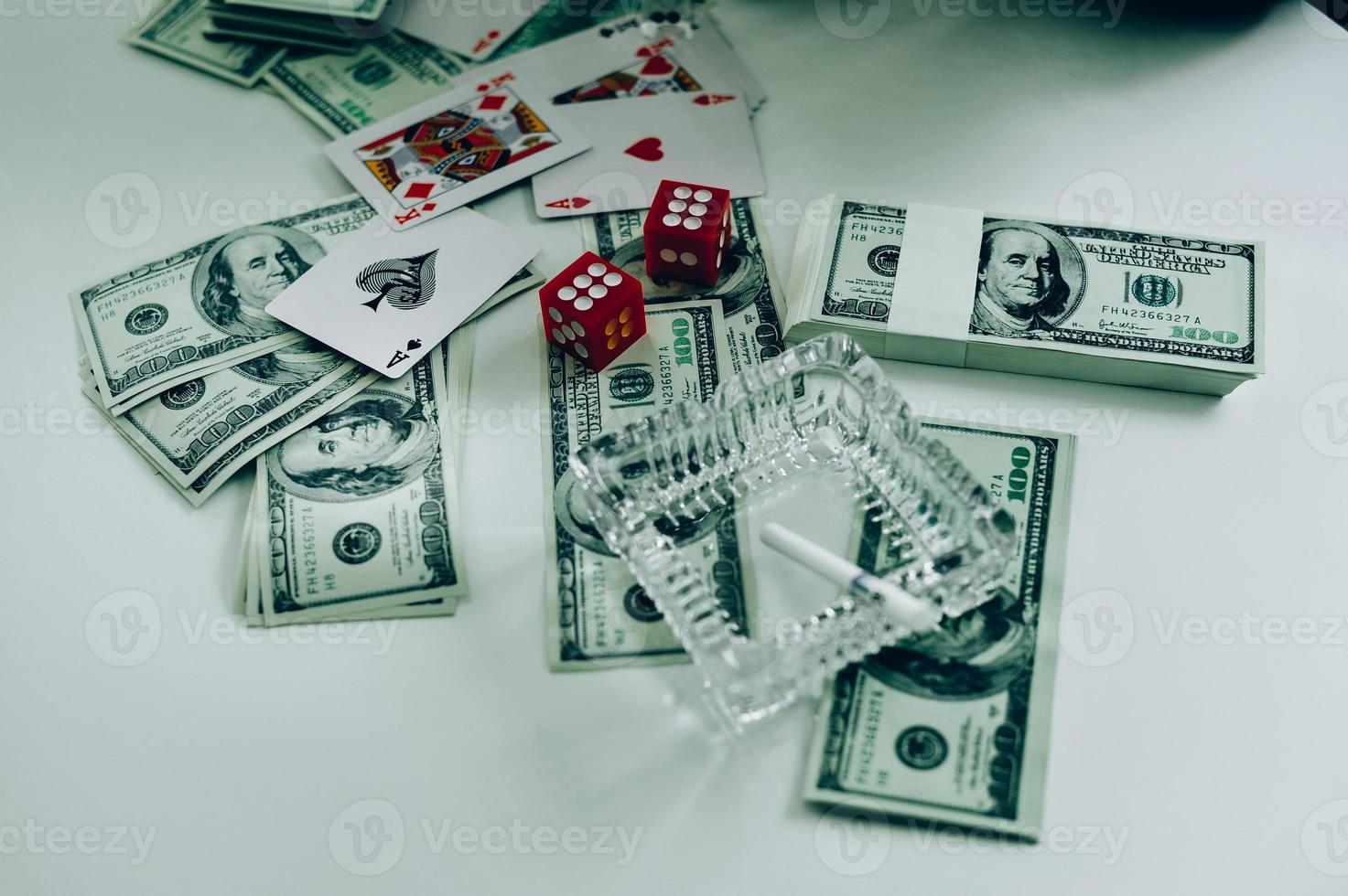 Money and hands of a young businessman. Success in the business. And his money. Put on the desk photo