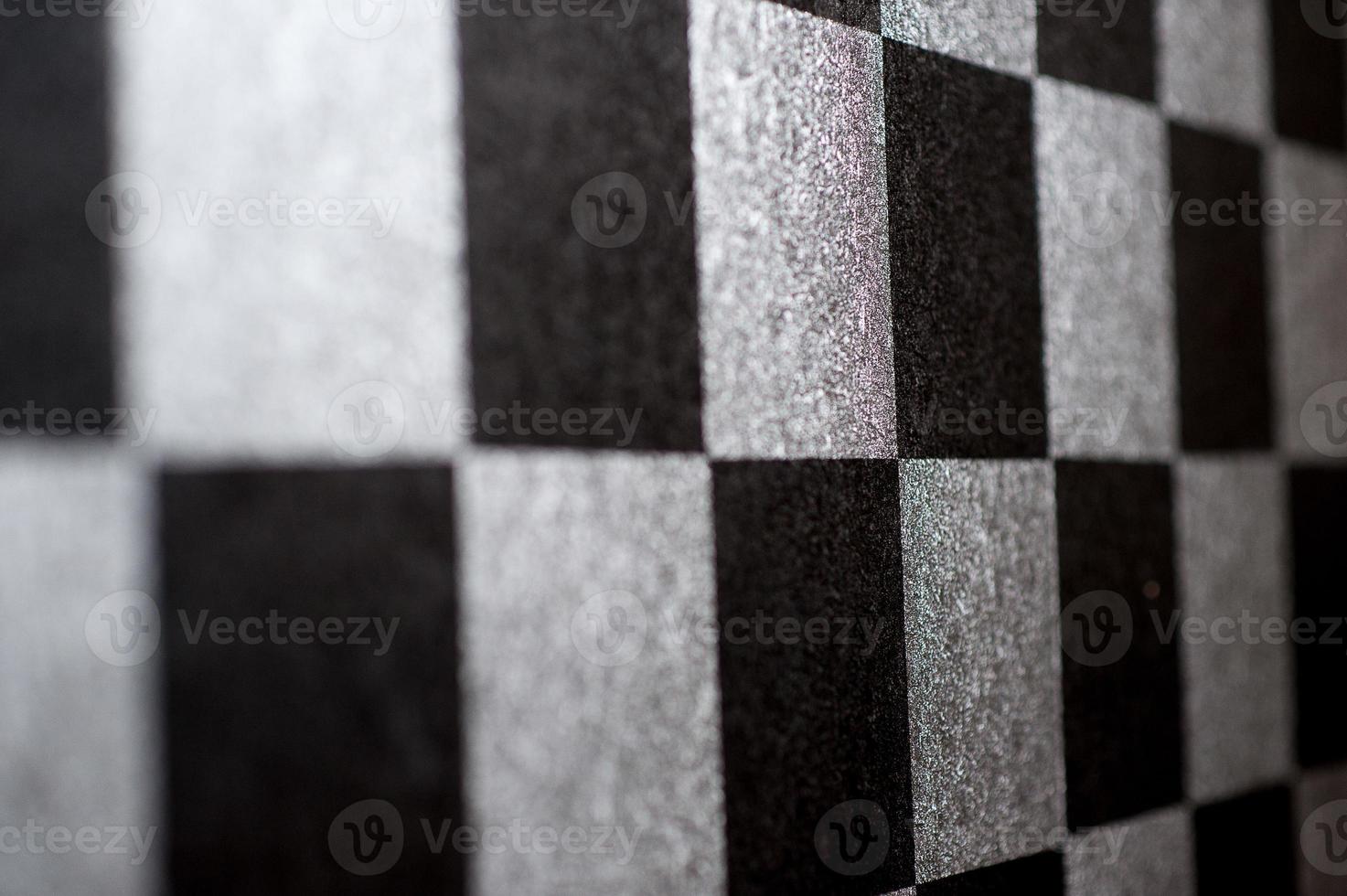 el tablero de ajedrez a cuadros en blanco y negro. foto