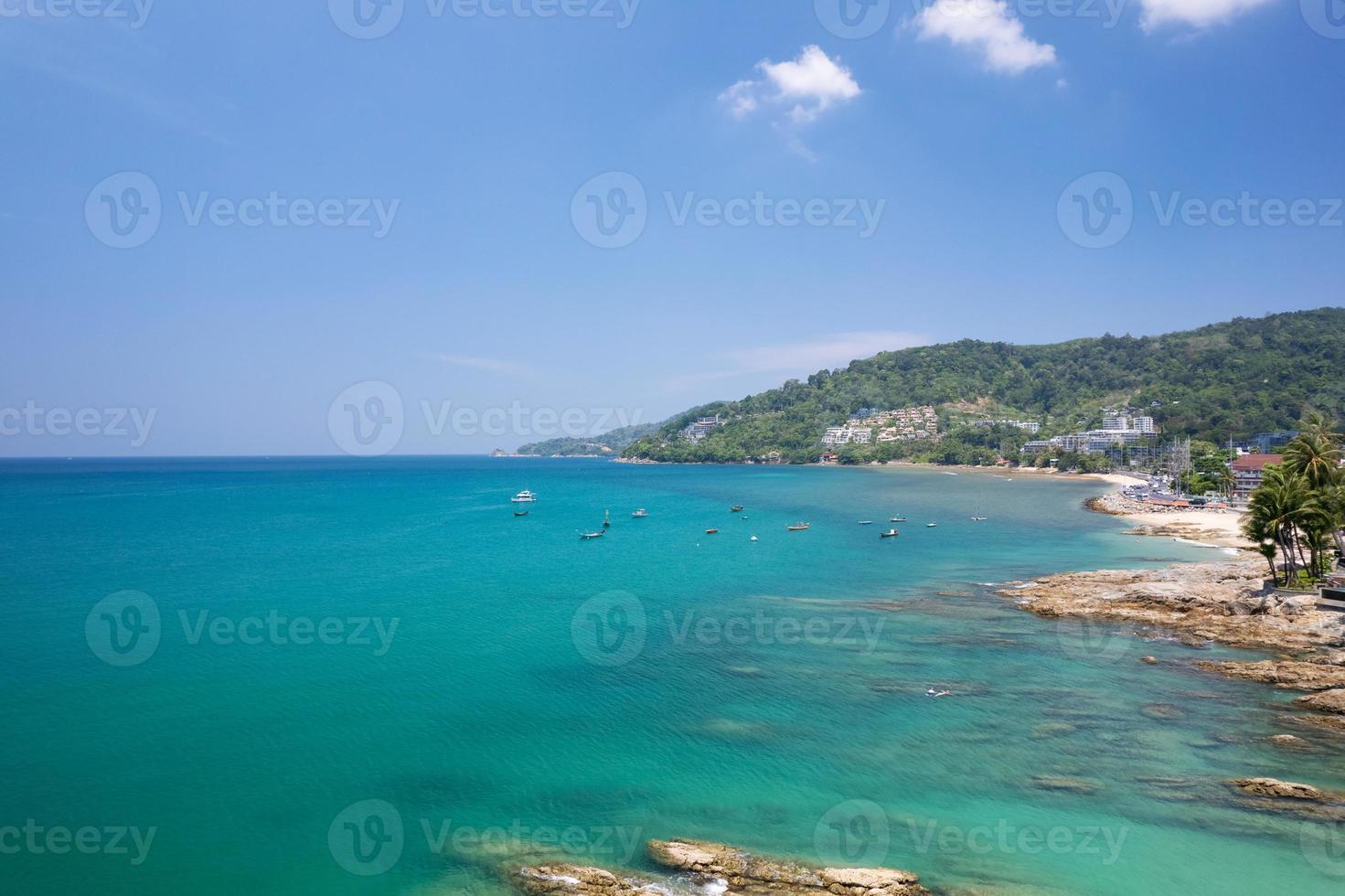 Aerial view drone shot of Kalim beach Phuket Thailand in March 11- 2022 Amazing beach beautiful sea in andaman sea Aerial view Drone camera High angle view. photo