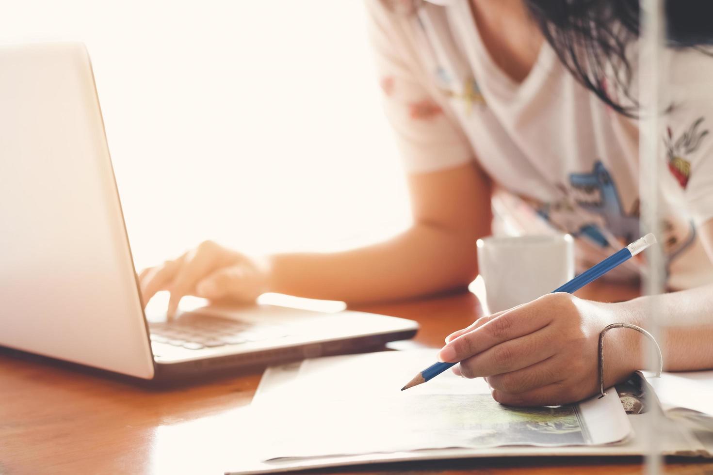 Business woman making notes at home workplace . Business job offer, financial success, certified public accountant concept, work from home concept. photo