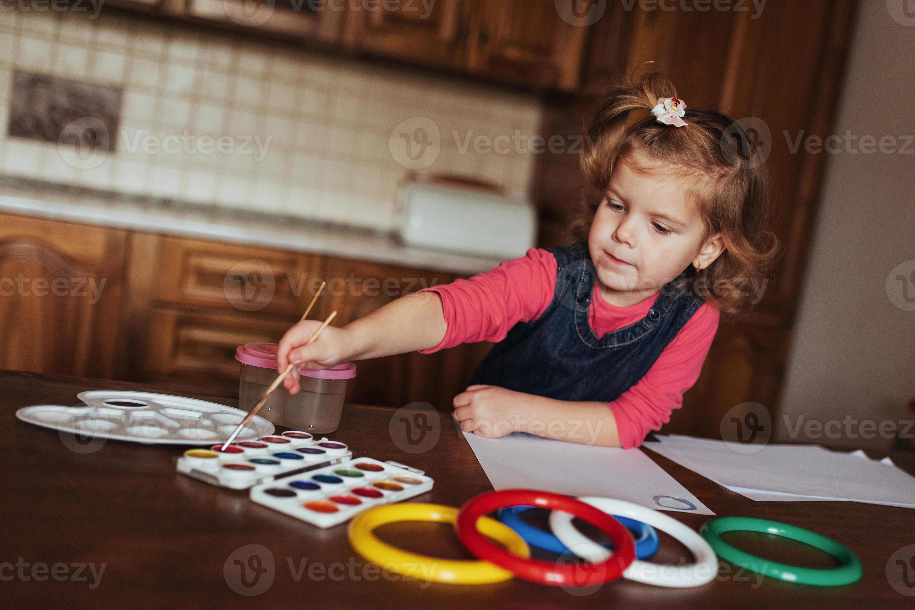 cute-little-girl-adorable-preschooler-painting-with-watercolors