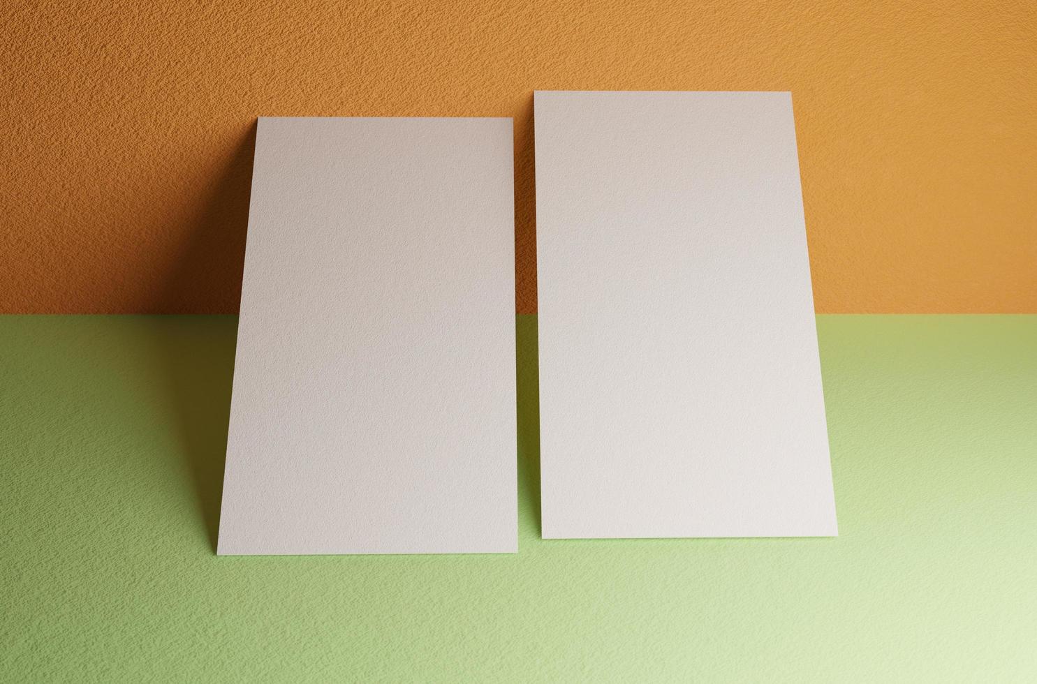 Double business card mockup leaning the wall photo
