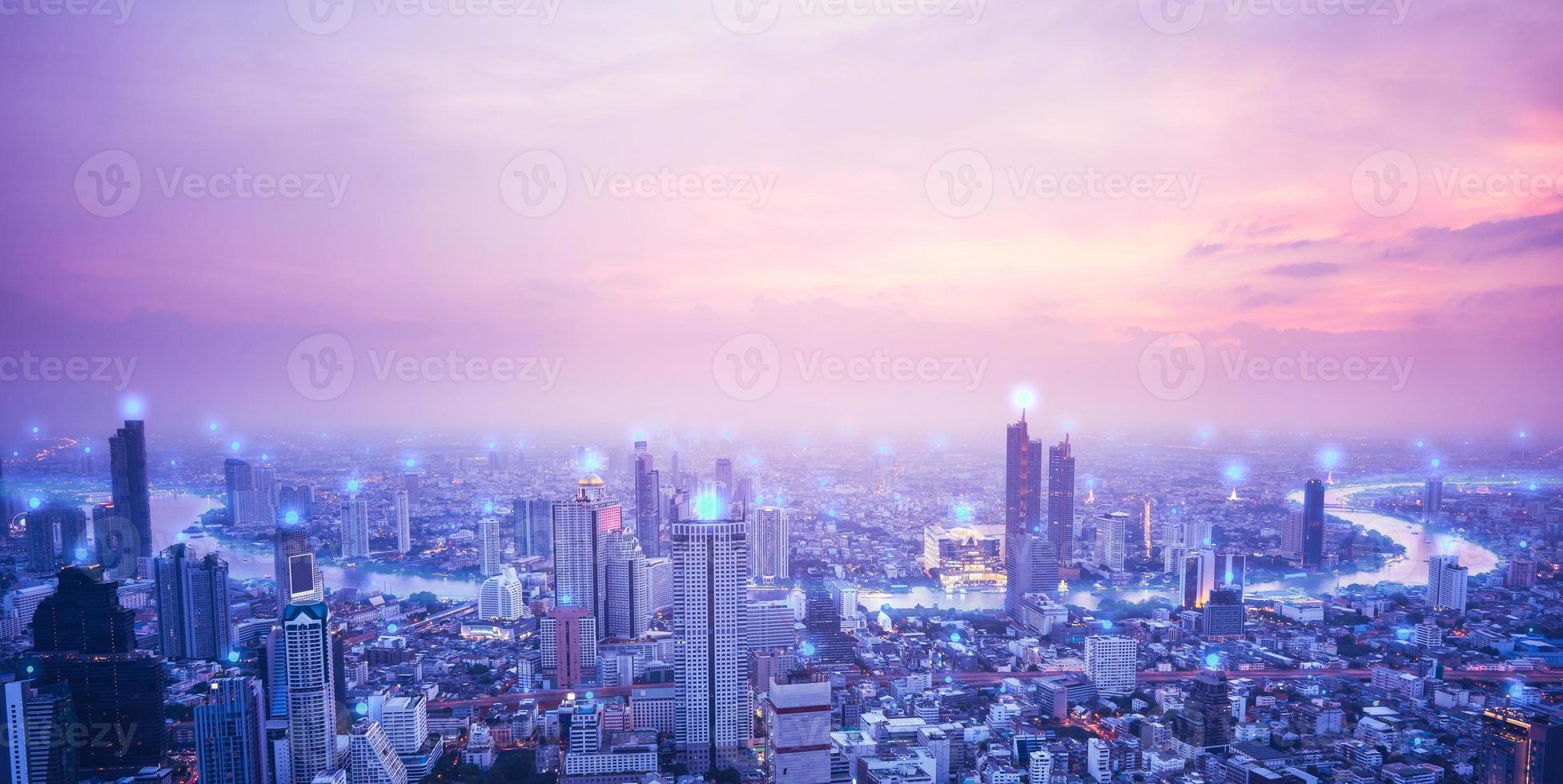 Digital network connection technology concept. Bangkok city at sunset photo