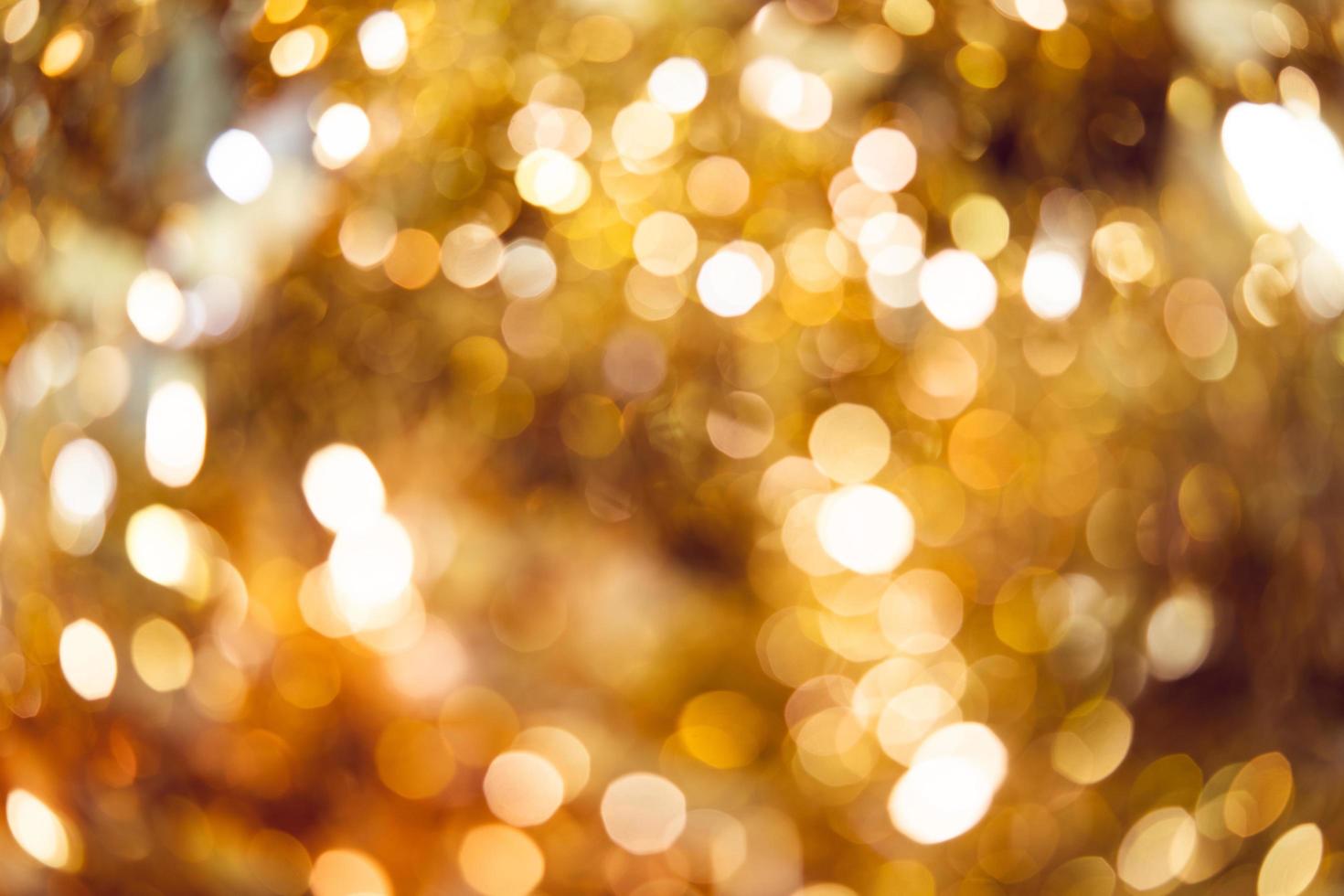 Sparkle bokeh golden light background. photo