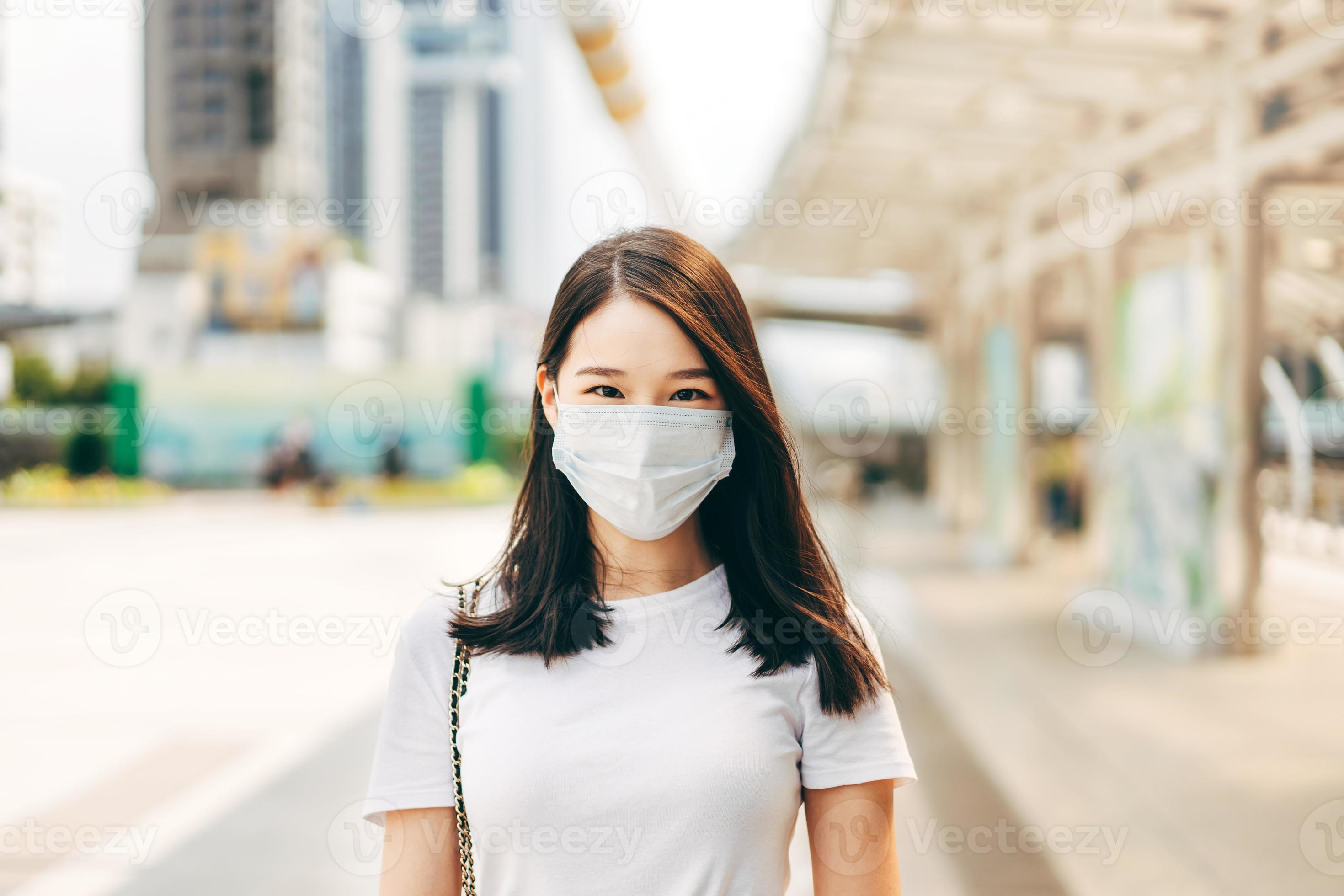 Adult business asian woman wear face mask for protect virus corona