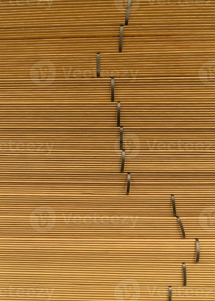 Stack of Corrugated Paper Preparing For Packaging in Factory photo