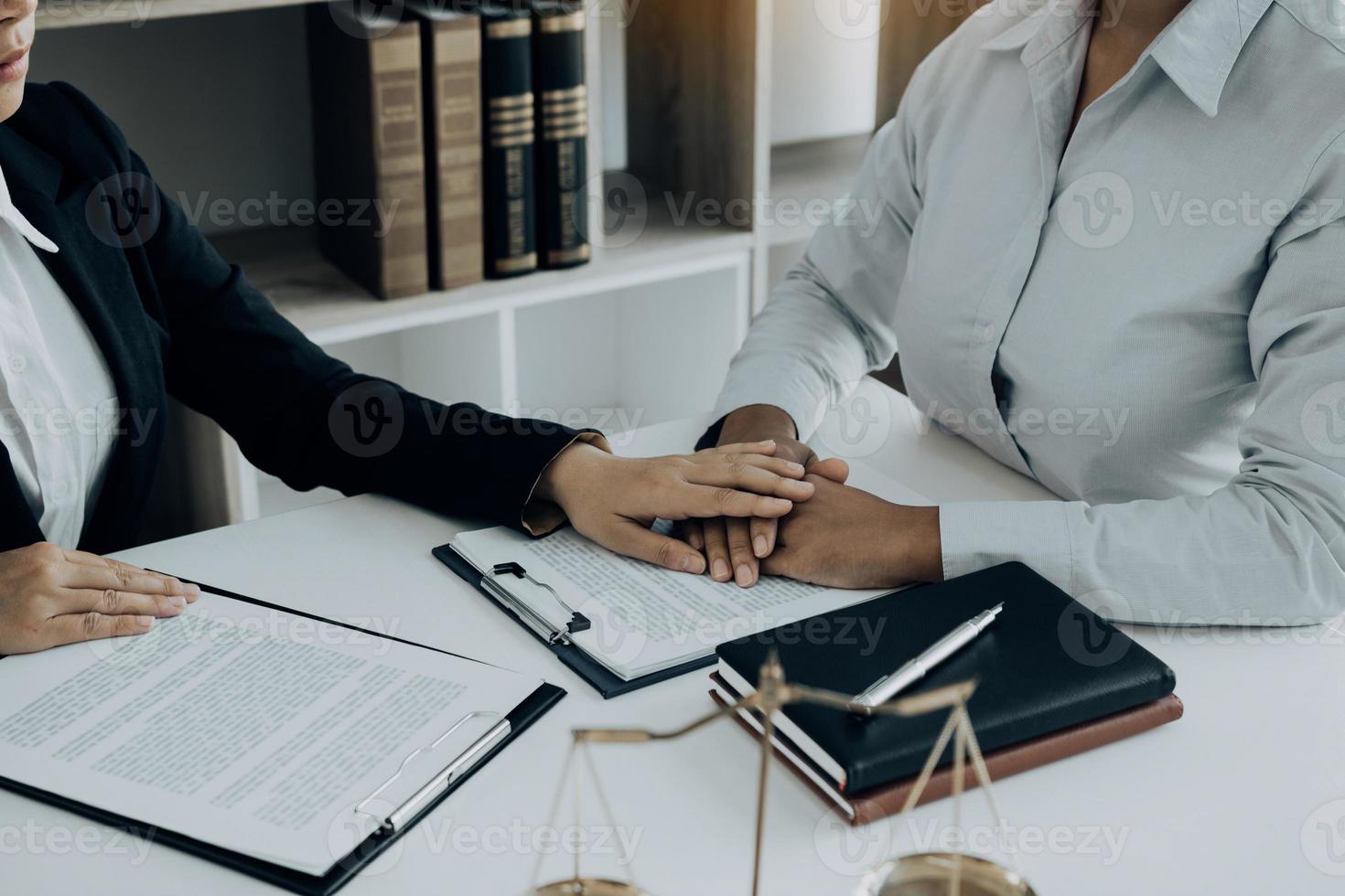 Lawyer is counseling the client in his counsel and will not escape the lawsuit. photo