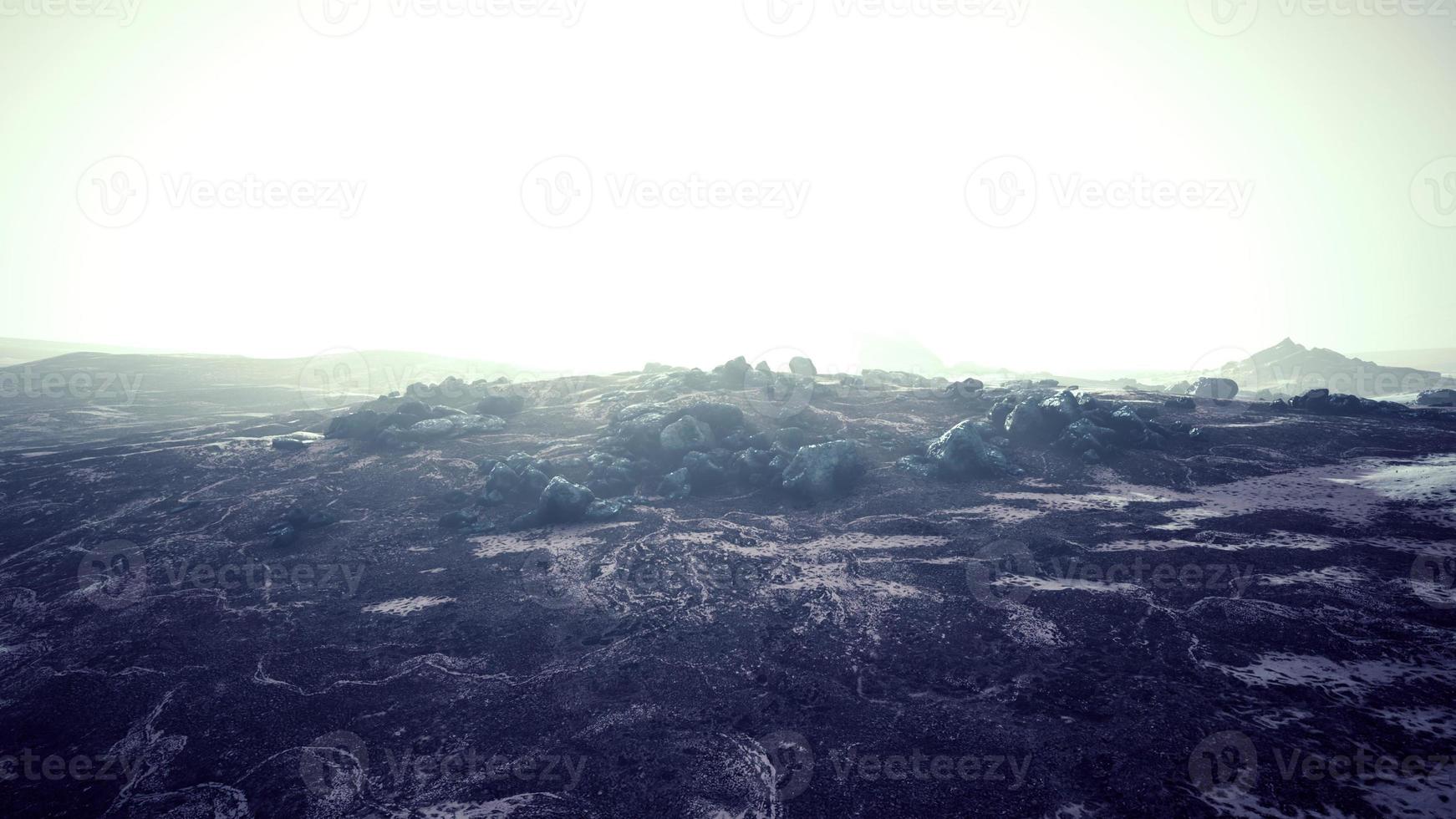 foggy mountain landscape with snow cornice over abyss inside cloud photo