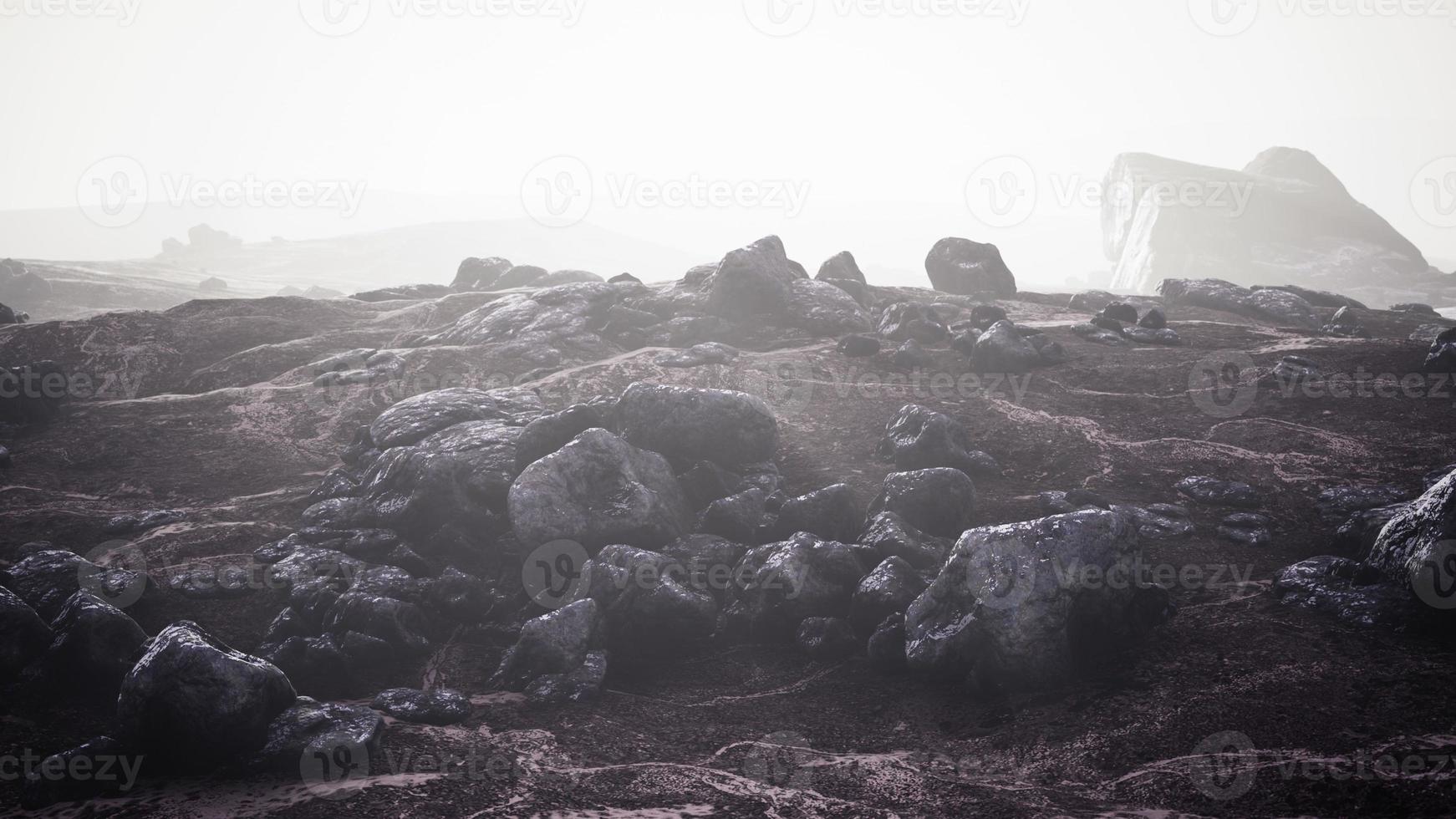 foggy mountain landscape with snow cornice over abyss inside cloud photo