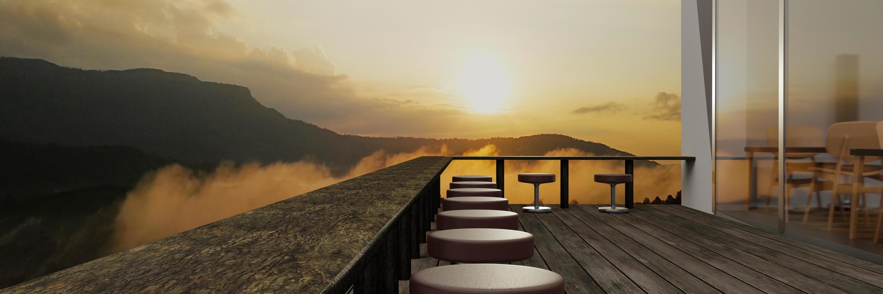 un restaurante o cafetería tiene un paisaje montañoso y algo de niebla matutina. la luz del sol en la cima de la colina. pisos de tablones de balcón o terraza y mesas largas de madera y madera foto