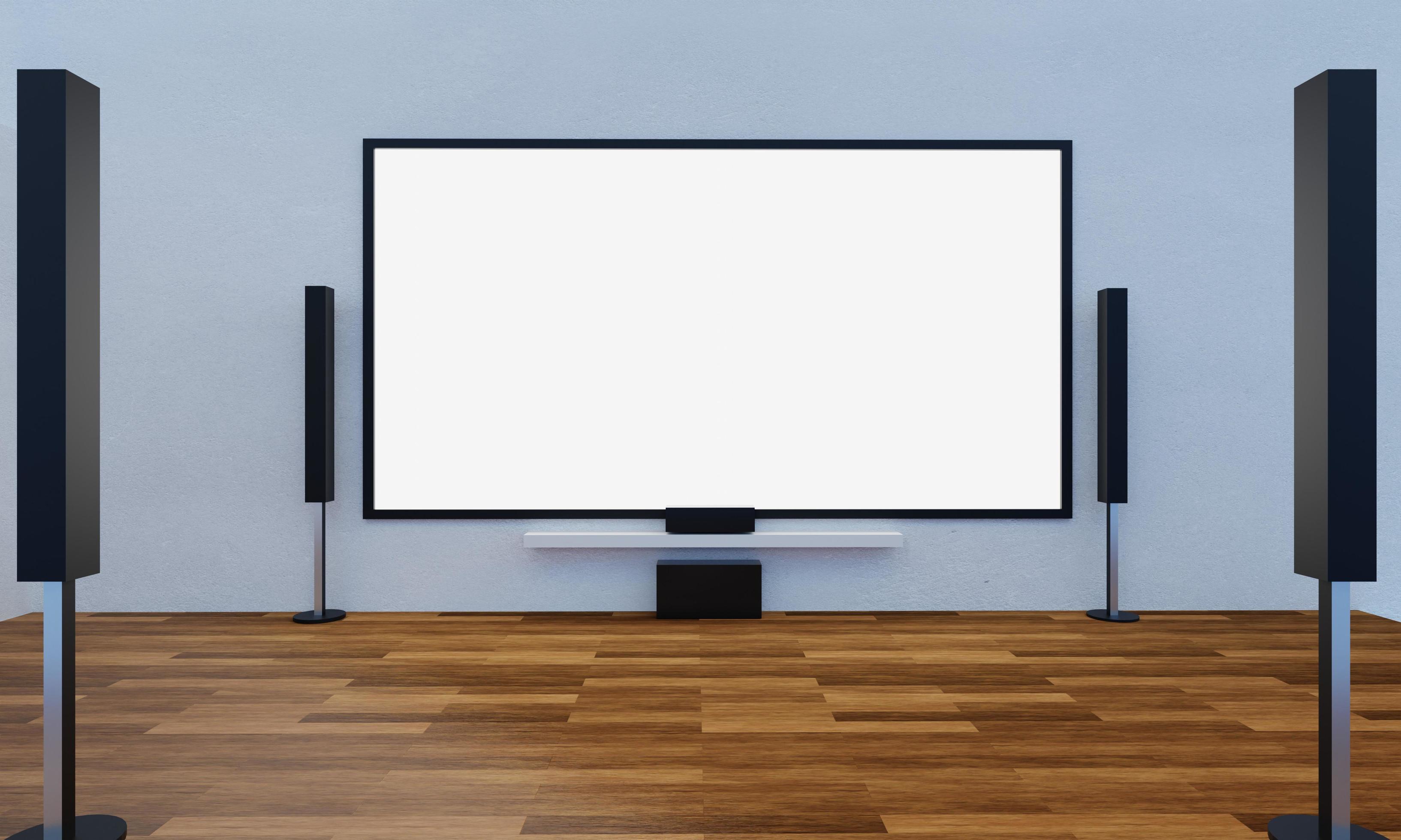 Home Theater on white plaster wall. Big wall screen TV and Audio