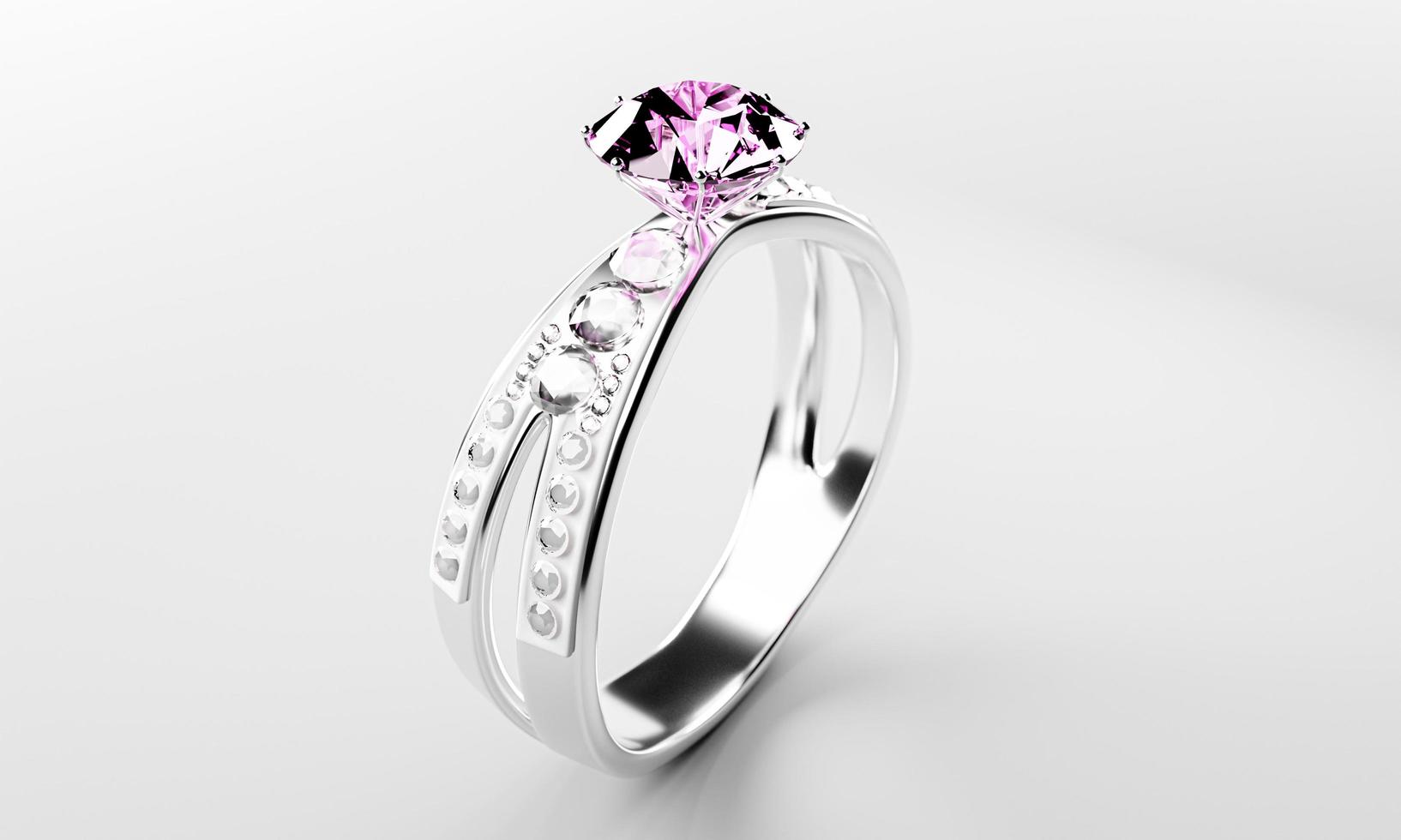el gran diamante rosa está rodeado de muchos diamantes en el anillo de oro platino colocado sobre un fondo gris. Elegante anillo de bodas con diamantes para mujer. representación 3d foto