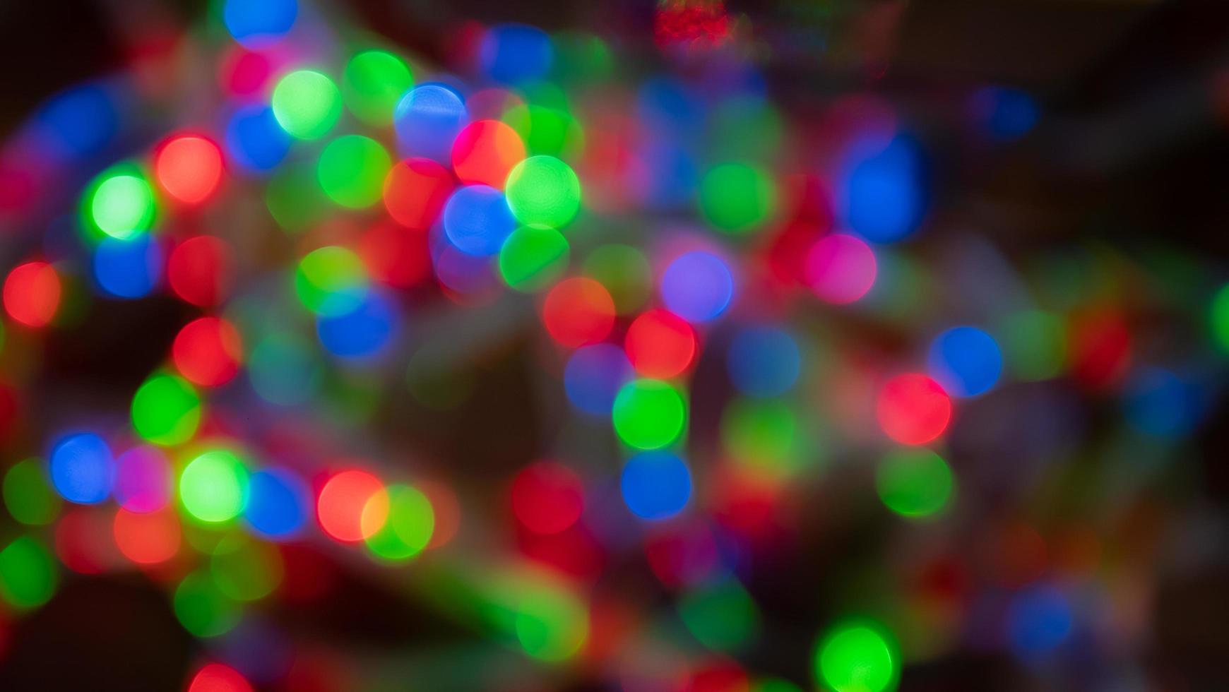Circle lights bokeh from blue , green and red lights. Blur the lights to decorate circles to create bokeh for use as background or wallpaper photo