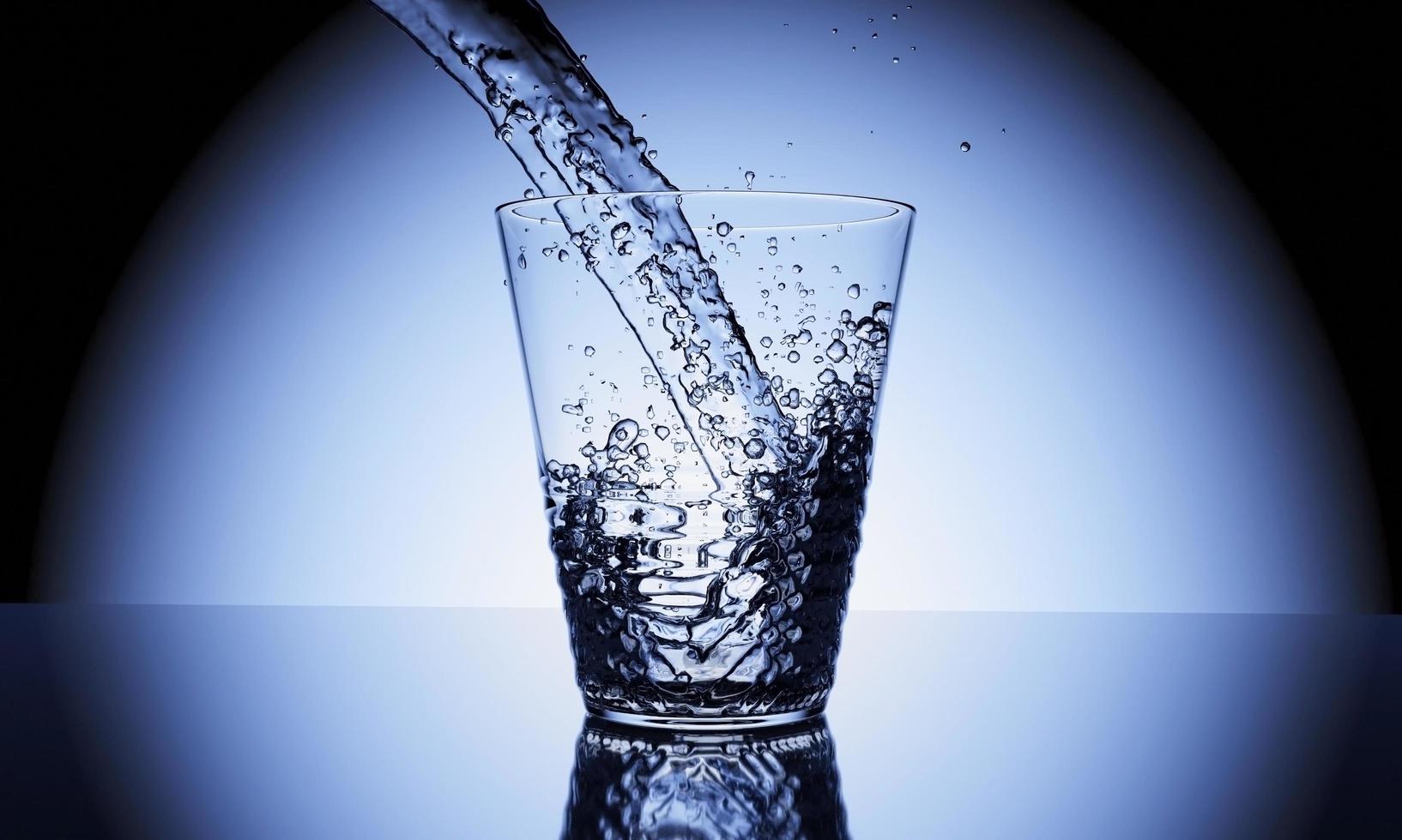 3D Rendering of  Pour water on glass with reflection on table surface photo