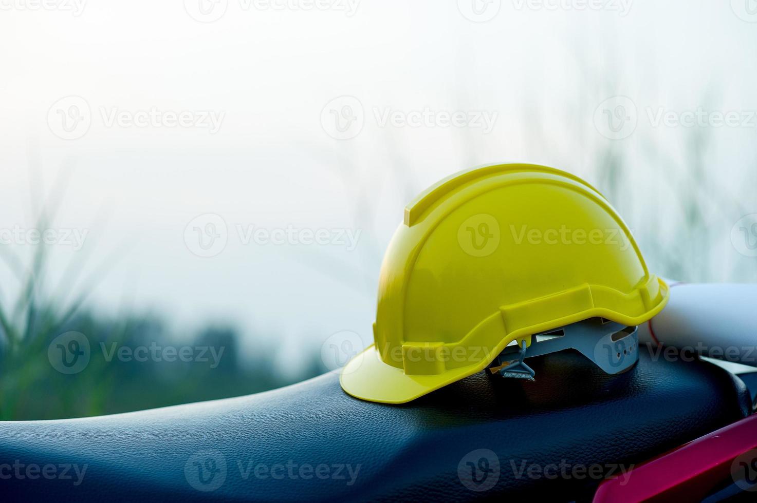 Engineering caps placed on paper. The concept of engineering. With copy space photo
