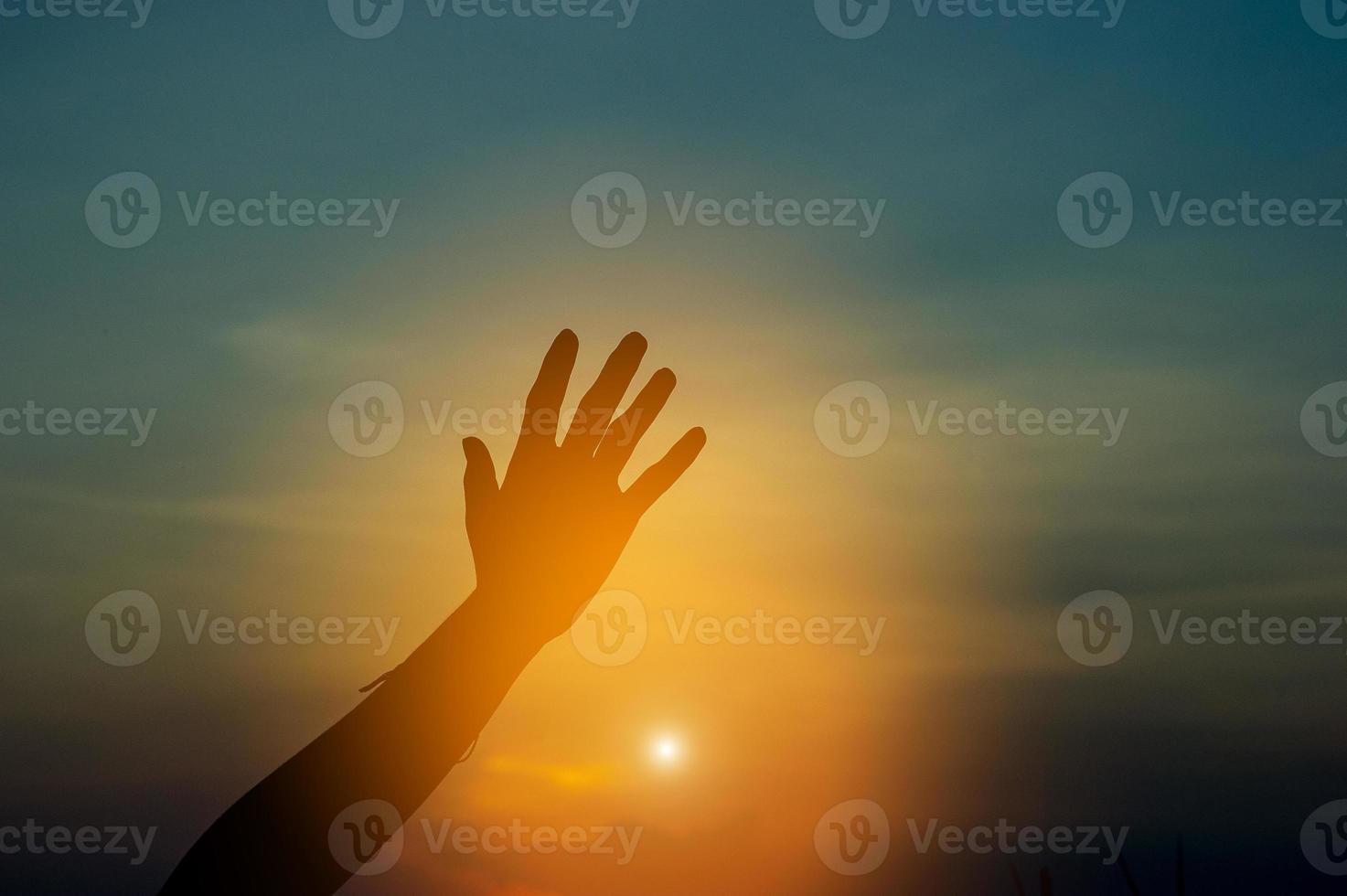 Hand and shadow in the corner. sunset And there is show of love.  silhouette concept With copy space photo