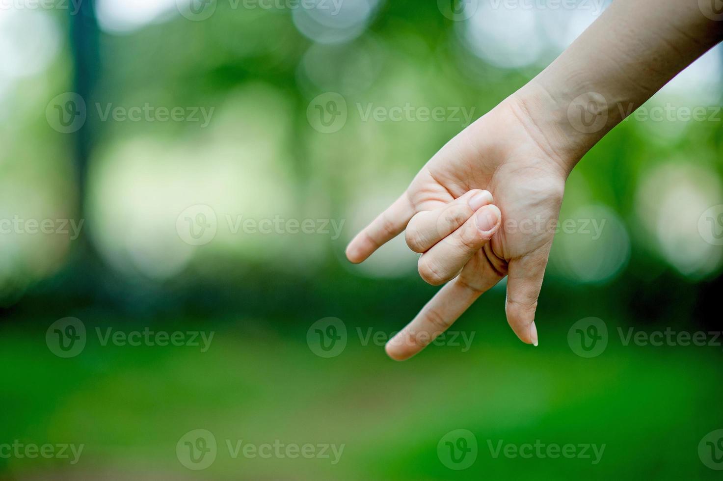 The hands of a beautiful girl The shape of the heart is an expression of love, body, mind, photo