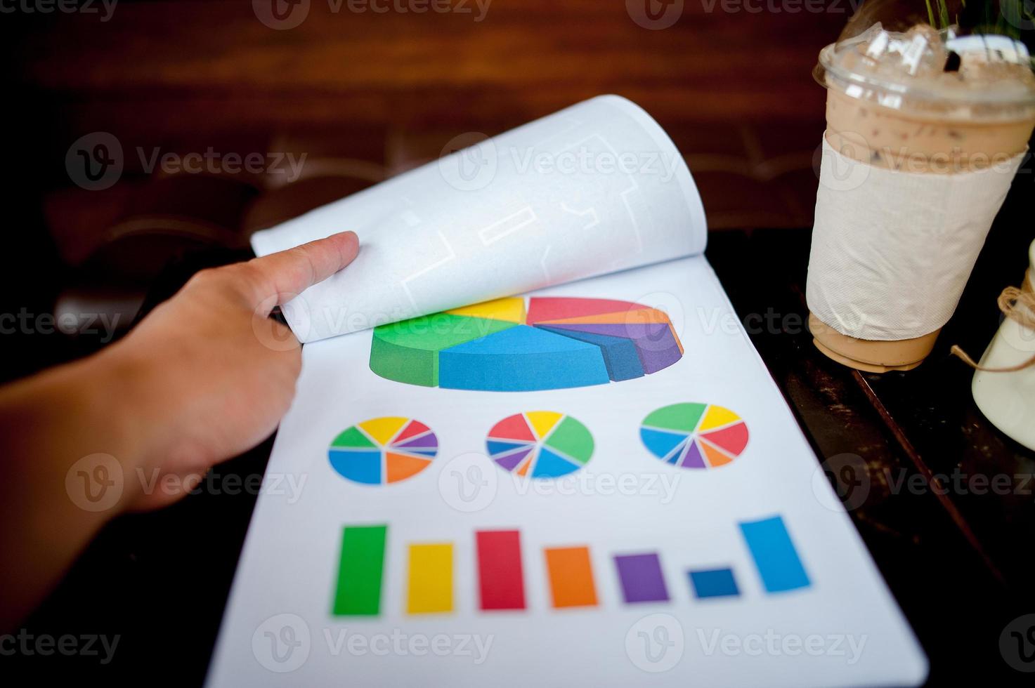 Work Desk Home Hand of the Worker Graph Paper Business Success With copy space photo