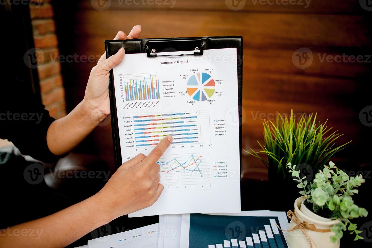 Work Desk Home Hand of the Worker Graph Paper Business Success With copy space photo