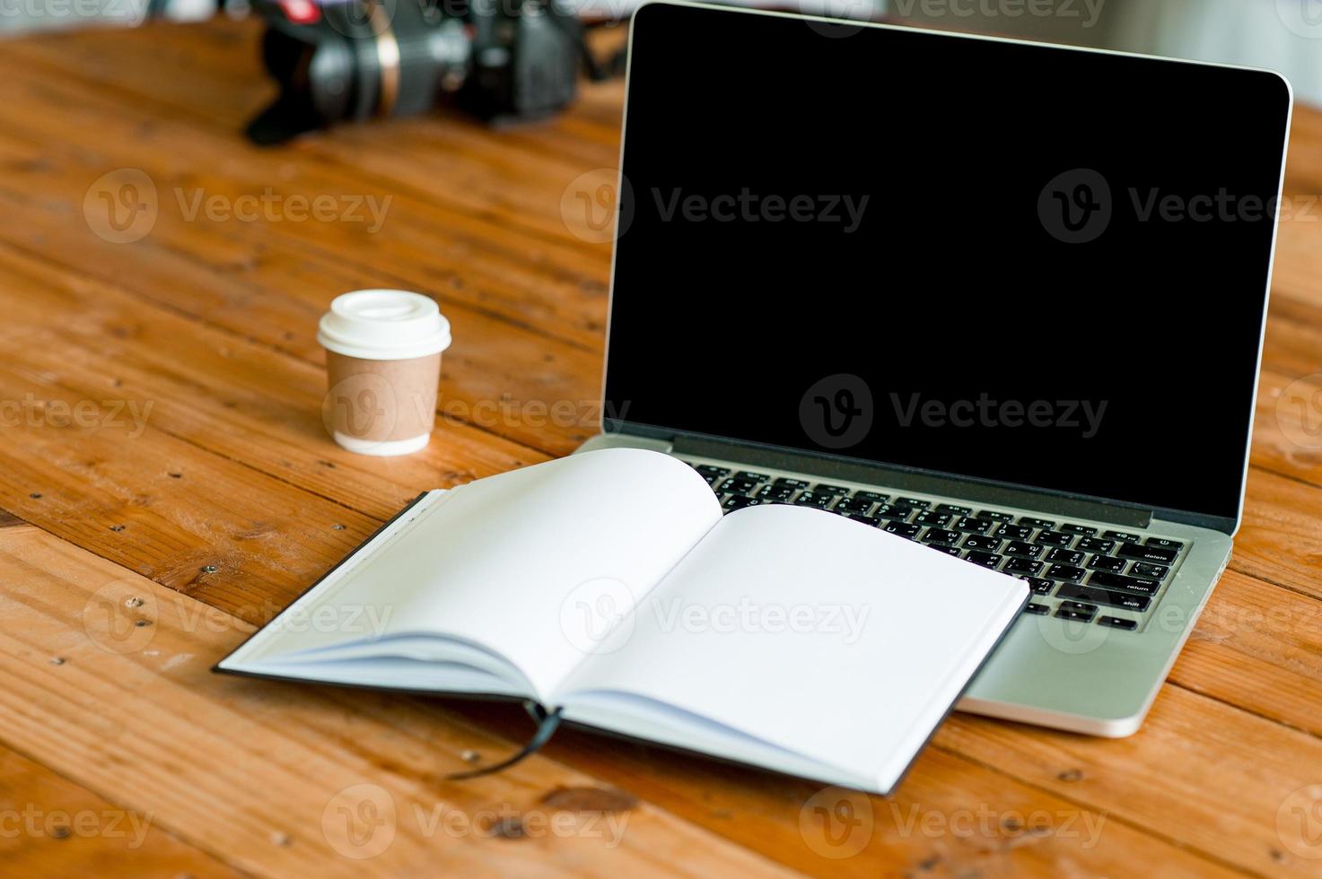 A desk with a business computer and a note on the desk. Business concept with copy space. photo