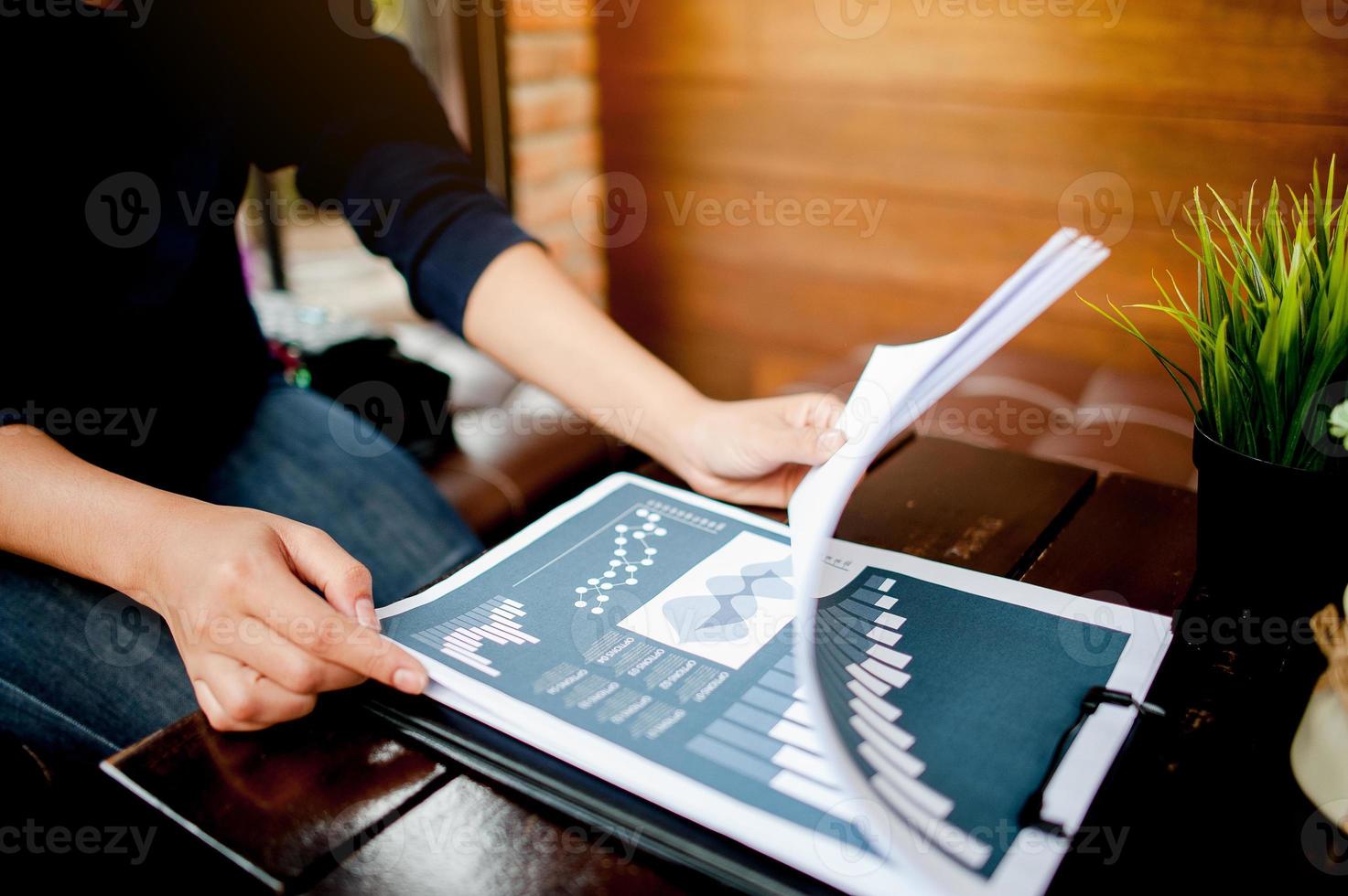 Work Desk Home Hand of the Worker Graph Paper Business Success With copy space photo