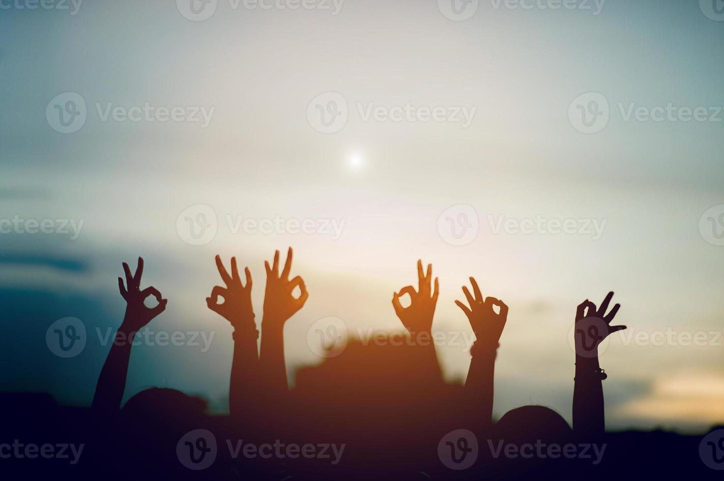 The hands of young people show joy. Happy in paradise Teamwork concept And there is a copy space. photo