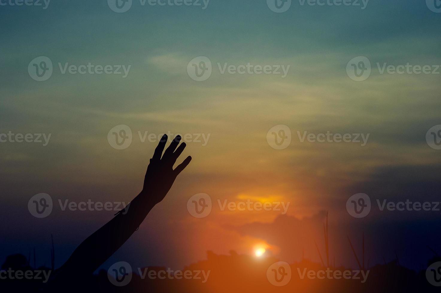 Hand and shadow in the corner. sunset And there is show of love.  silhouette concept With copy space photo