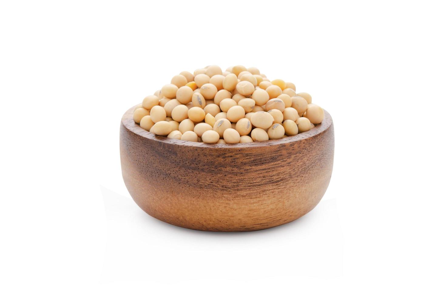 Soybeans in bowl wood isolated on white background with clipping path photo