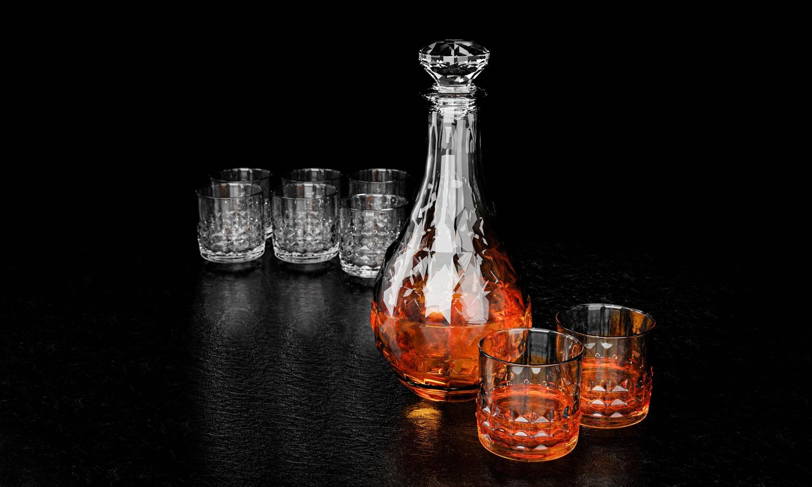 The bottle and glass have an elegant pattern for brandy or whiskey. The glass bottle has a diamond-shaped cork. The bottle and the glass are crystal-patterned with a black background and a black photo