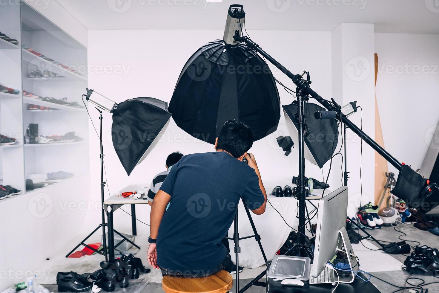 Behind the scene of photoshoot with studio lighting set photo