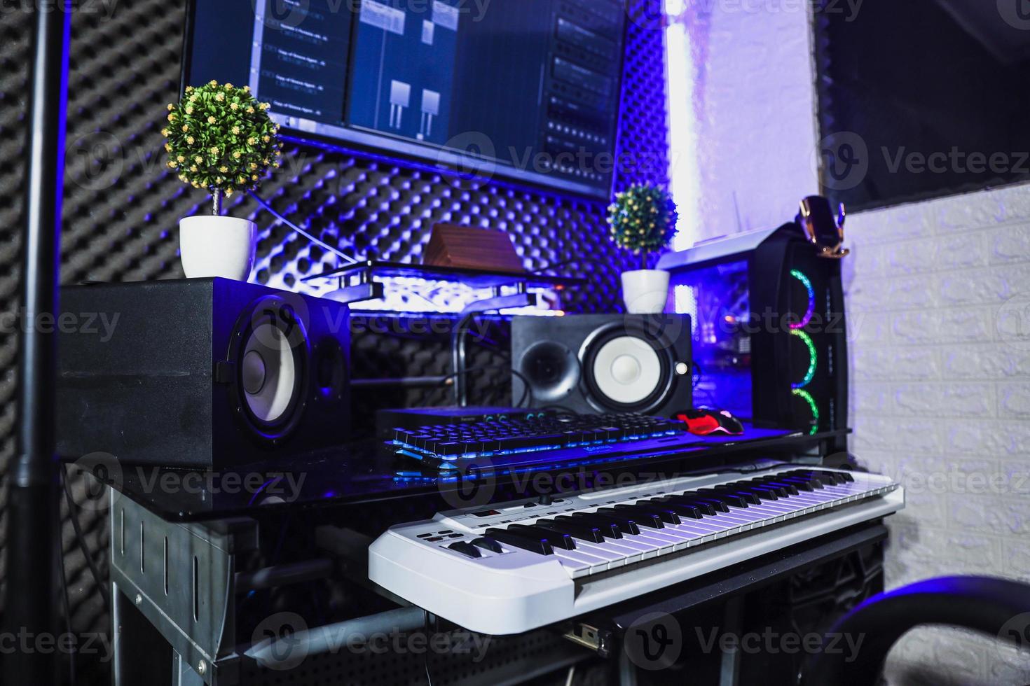Mini studio recording with speaker and electric piano photo