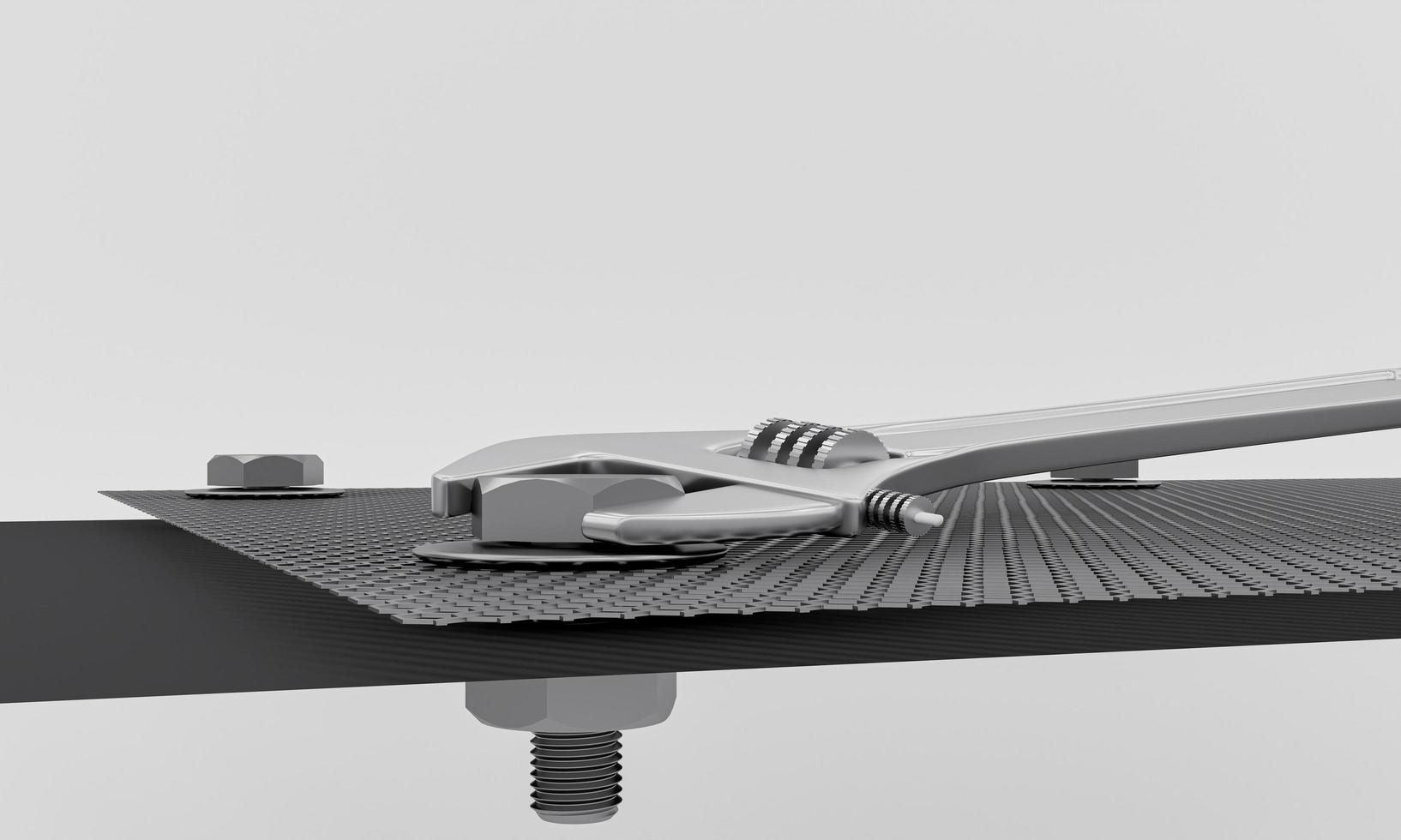 Adjustable wrench on The silver metal plate has bolts and nuts attached to the corners. Nut and bolts placed on a silver metal plate. 3D Rendering. photo