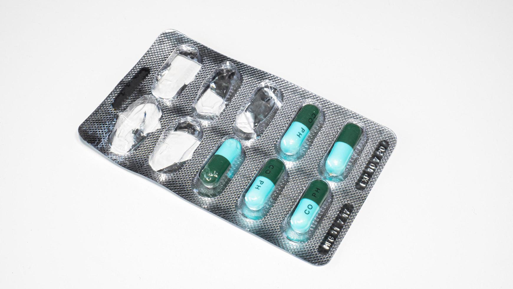 Aluminum  tablet for pill capsules. The medicine panel has been applied on a white background. photo