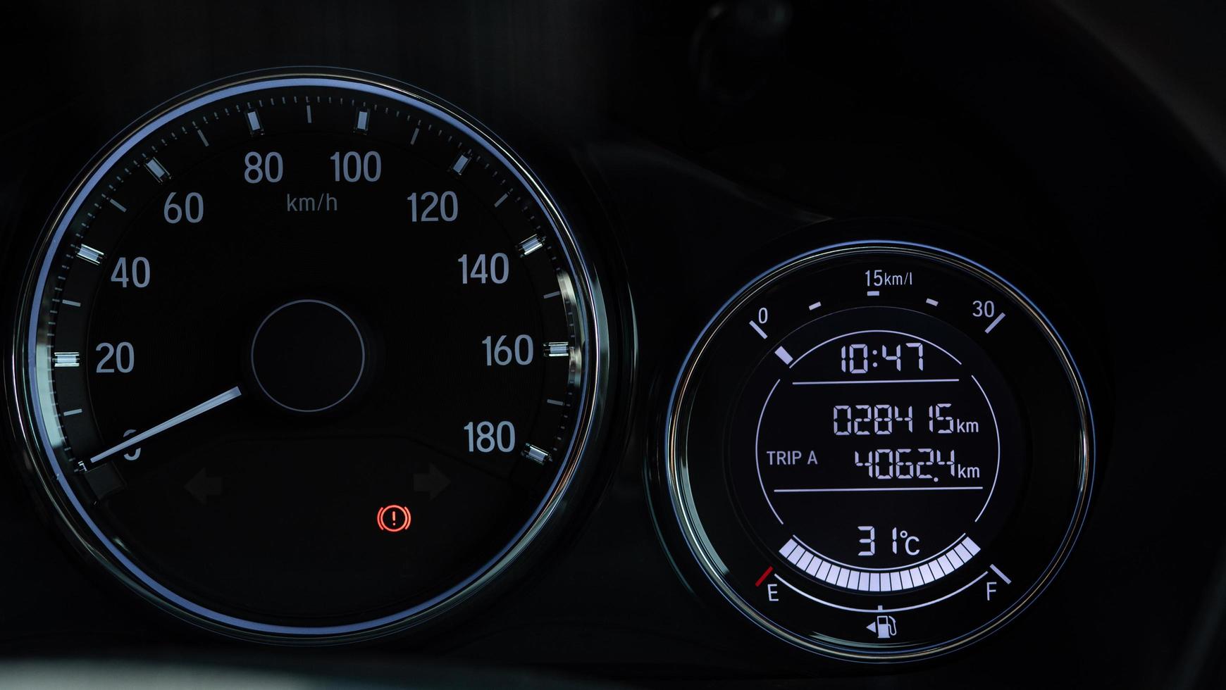 Closeup dashboard of mileage car. Mileage needle when parking and apply the hand brake. photo
