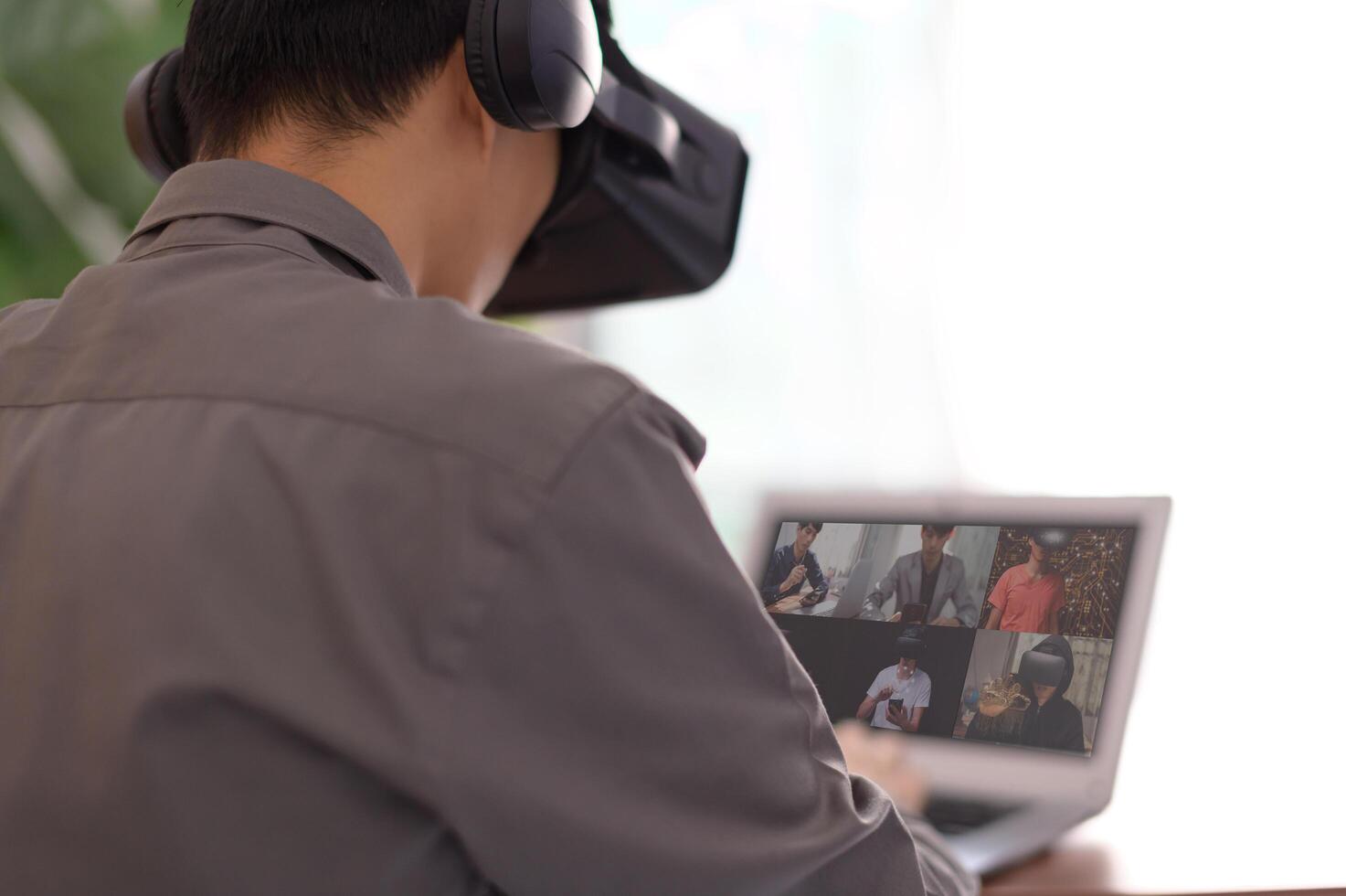 Businessman making call with colleagues online meeting, learning, teaching, online photo