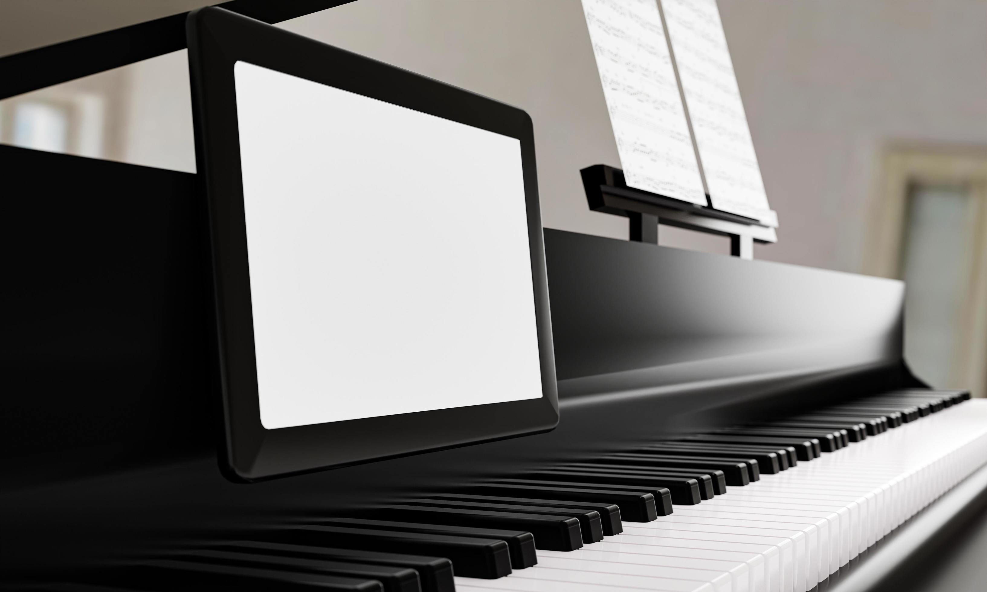 Learn piano online by yourself. Use a tablet or computer to learn piano  tutorials online. The black grand piano has a tablet placed on a notebook  stand. 3D Rendering. 6661781 Stock Photo