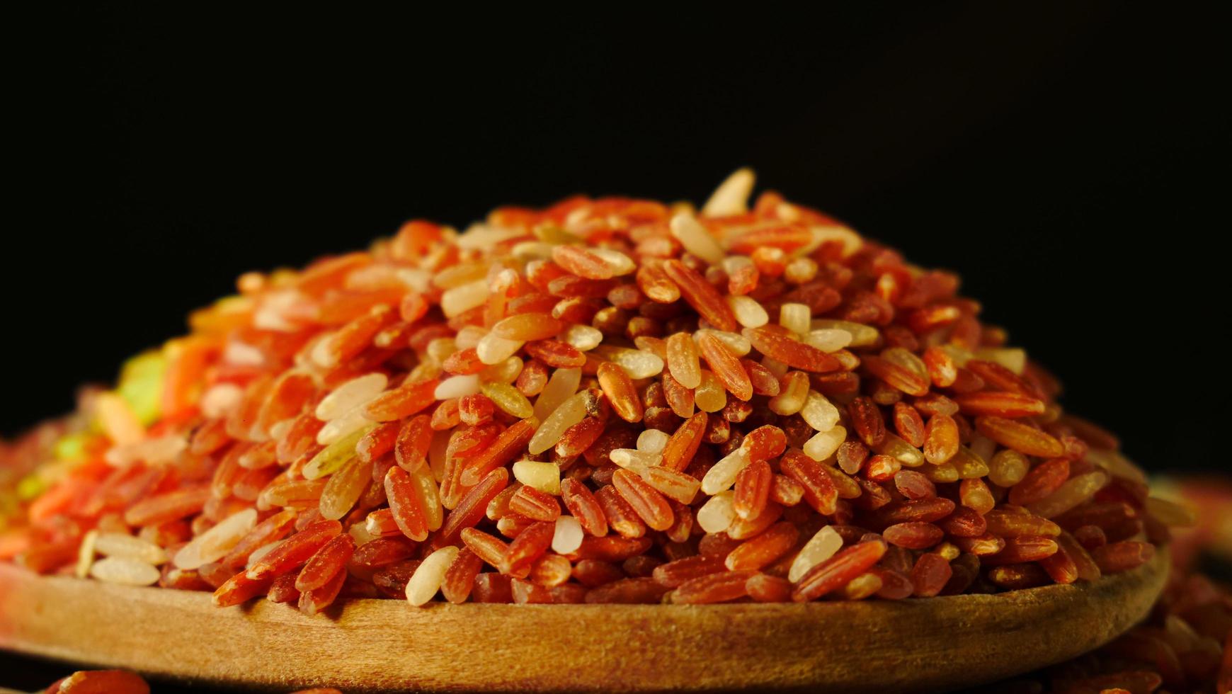 Rice grain varieties Red Jasmine Rice or Red Brown Rice. New native variety of Thailand. Vitamin B helps to treat allergies. And does not cause allergic reactions Suitable for patients with anemia. photo