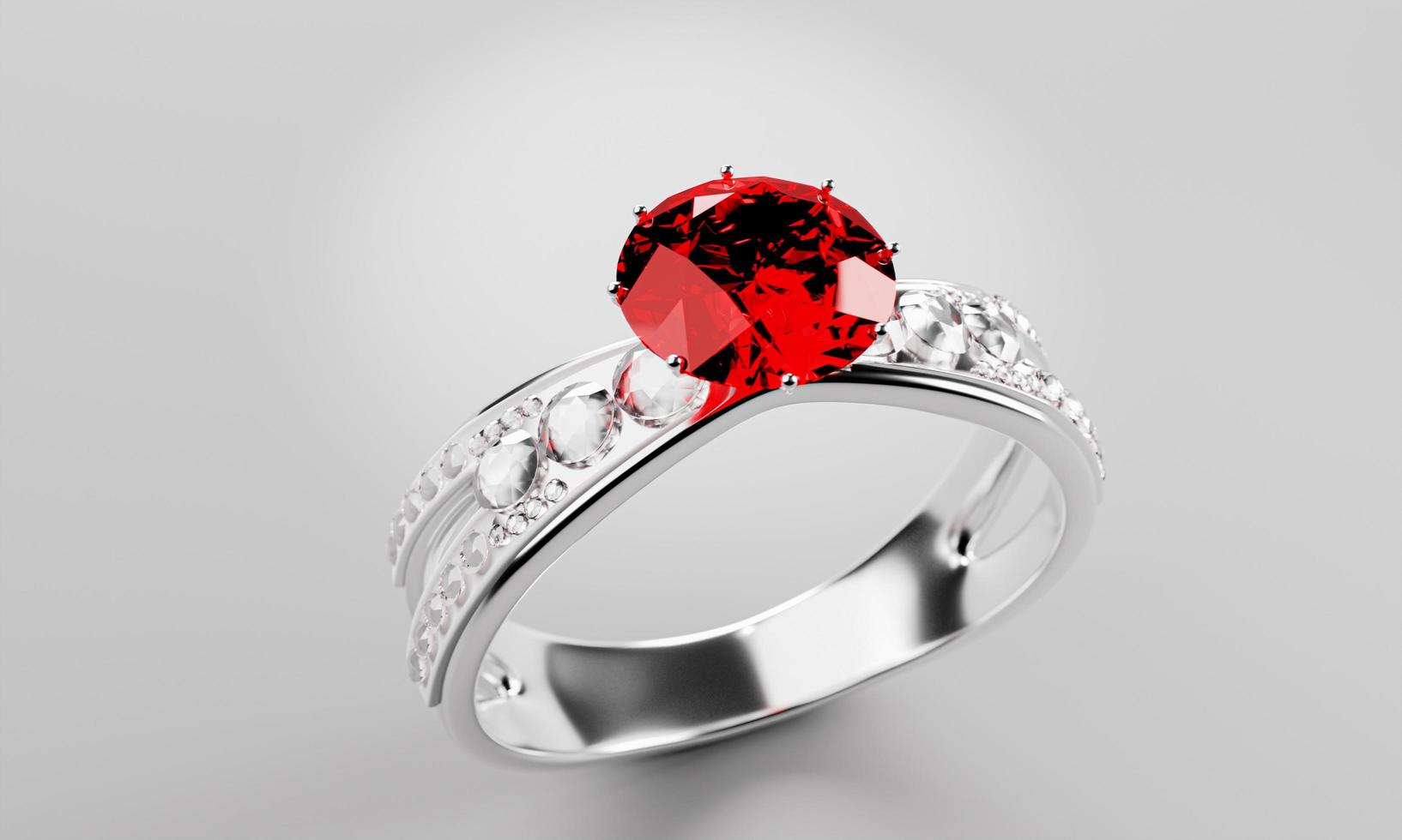 el gran diamante rojo o rubí está rodeado de muchos diamantes en el anillo de oro platino colocado sobre un fondo gris. Elegante anillo de bodas con diamantes para mujer. representación 3d foto