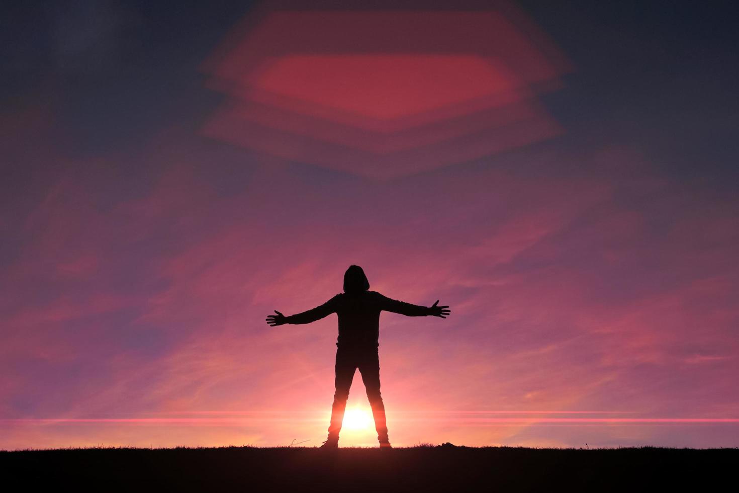 man silhouette trekking in the mountain with a beautiful sunset photo