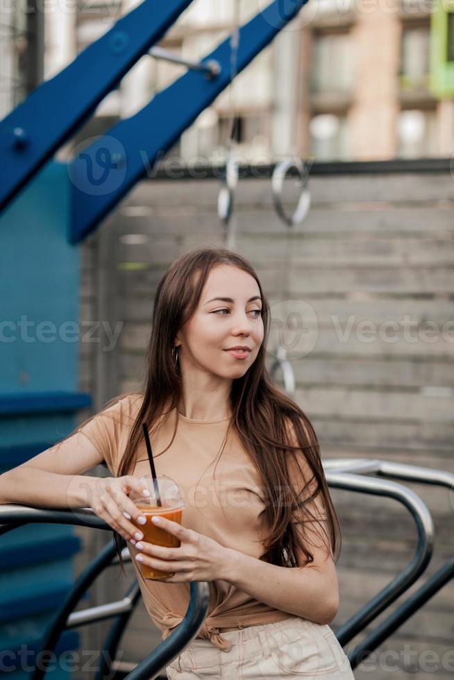 woman drinks fruit juice photo