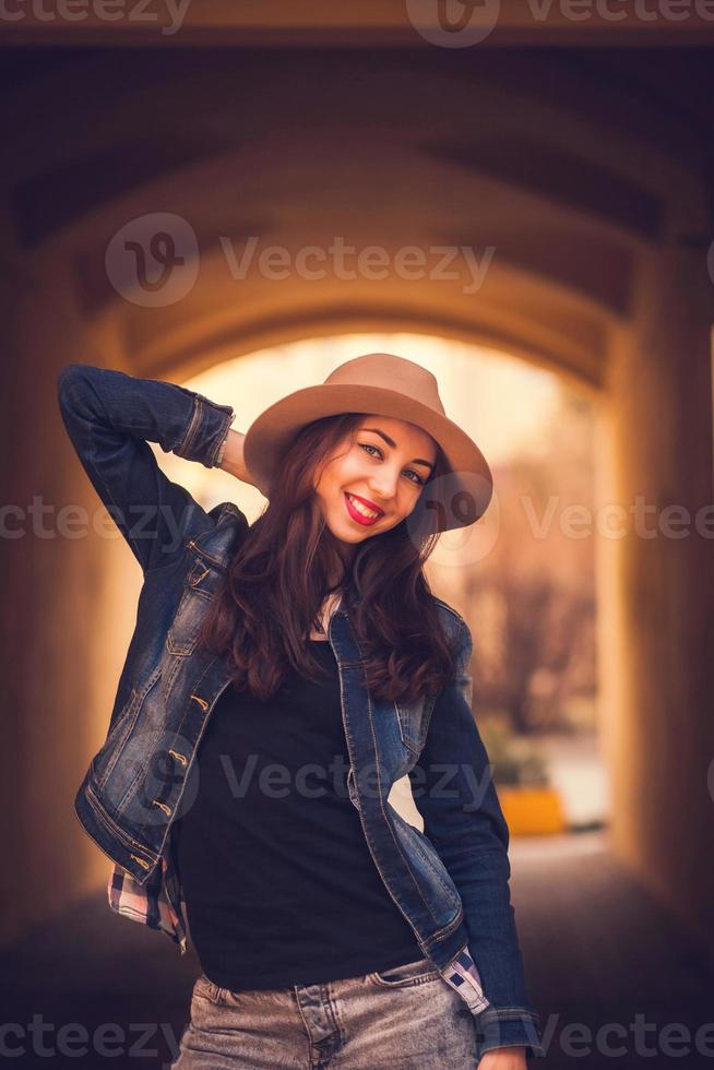 cheerful girl in hat posing photo