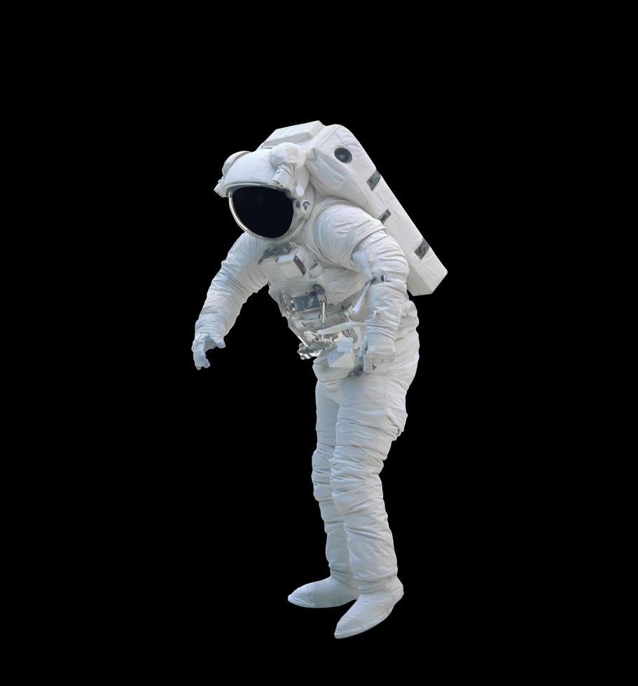 Space suits isolated on black background with clipping path. Elements of this image furnished by NASA. photo