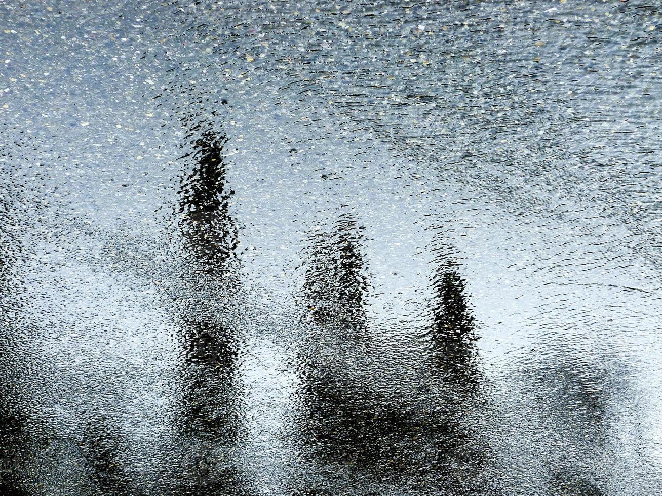 Abstract shiny background. Wet surface with reflections. photo