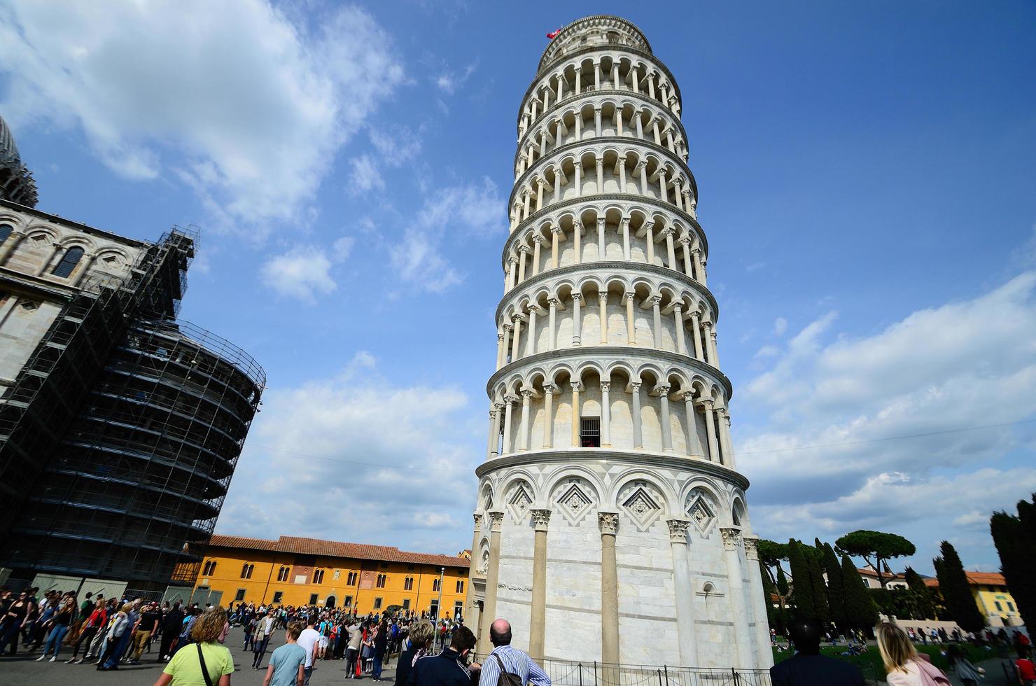 Leaning Tower of Pisa with tourists photo