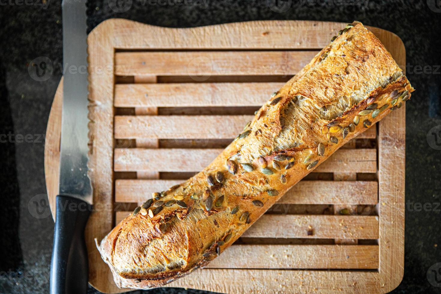 baguette pumpkin seeds french fresh bread fresh portion healthy meal food photo