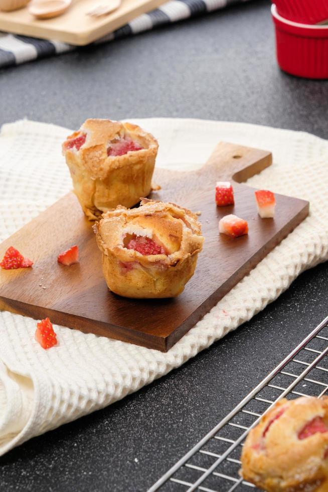 Homemade Strawberry cake topping with icing sugar. Sweet food. Sweet dessert. perfect summer season dessert served on plate. photo