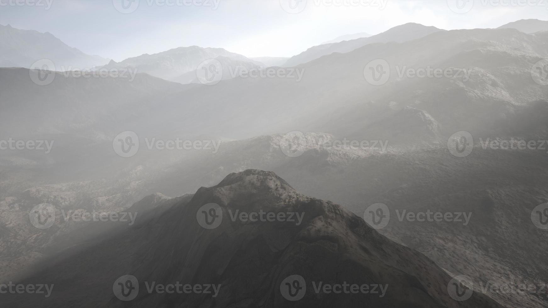 night desert landscape with rocky mountains and sunset photo