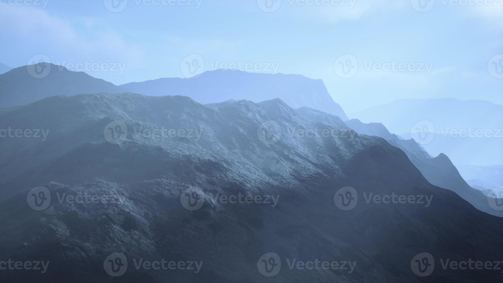 Stone field in dense fog in highlands photo